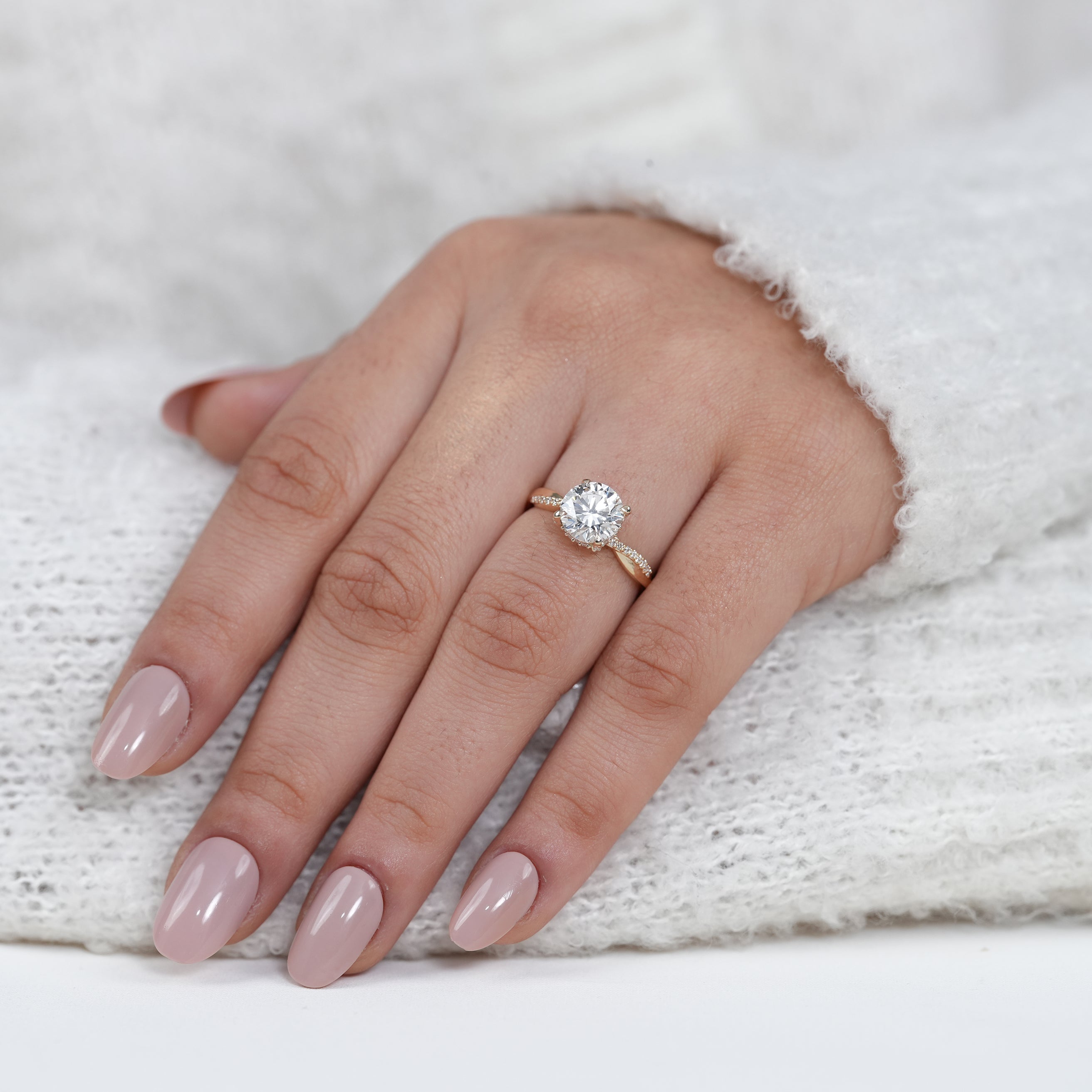 Classic round lab grown diamond ring with crossover shank