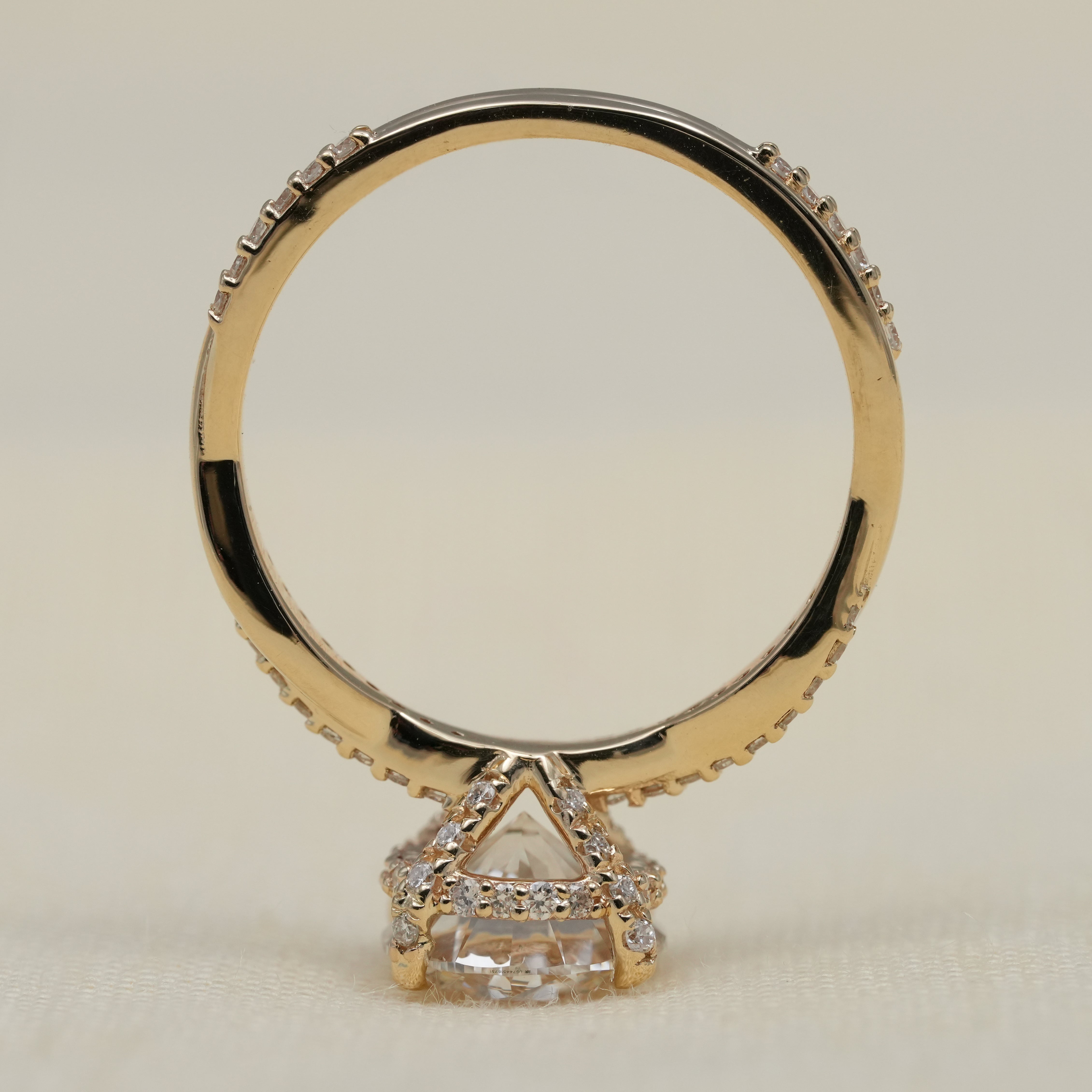 Round Diamond Solitaire Engagement Ring With Twisted Band