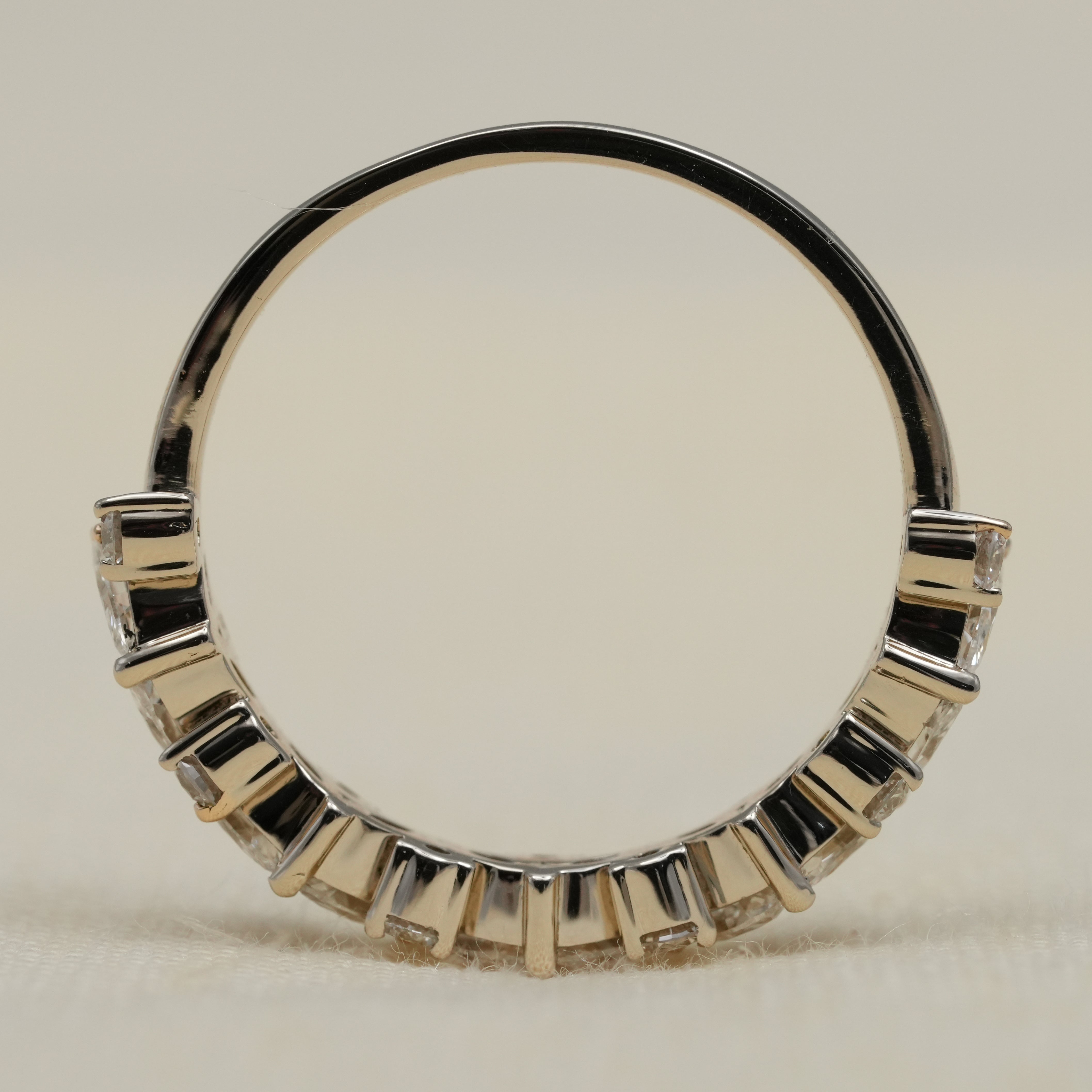 Yellow gold band with marquise lab grown diamond cluster