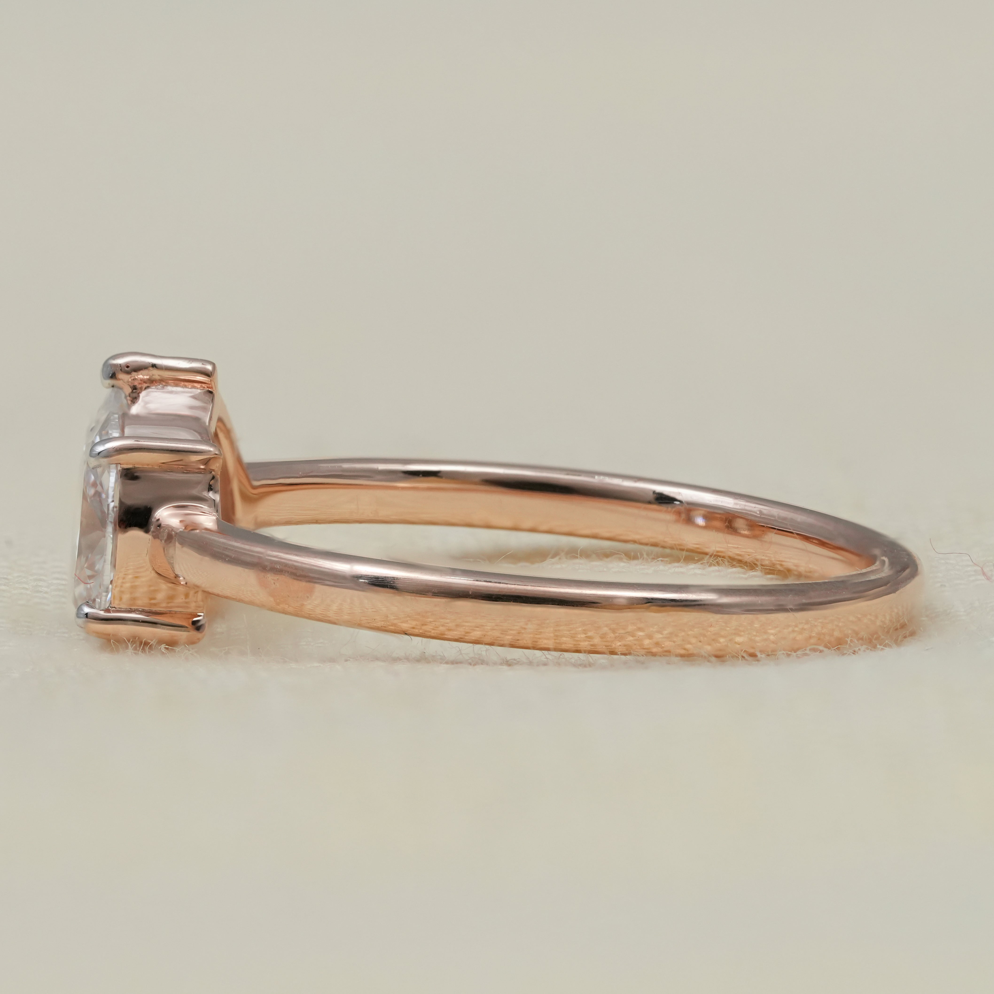 Modern two stone ring crafted with pear oval lab grown diamonds