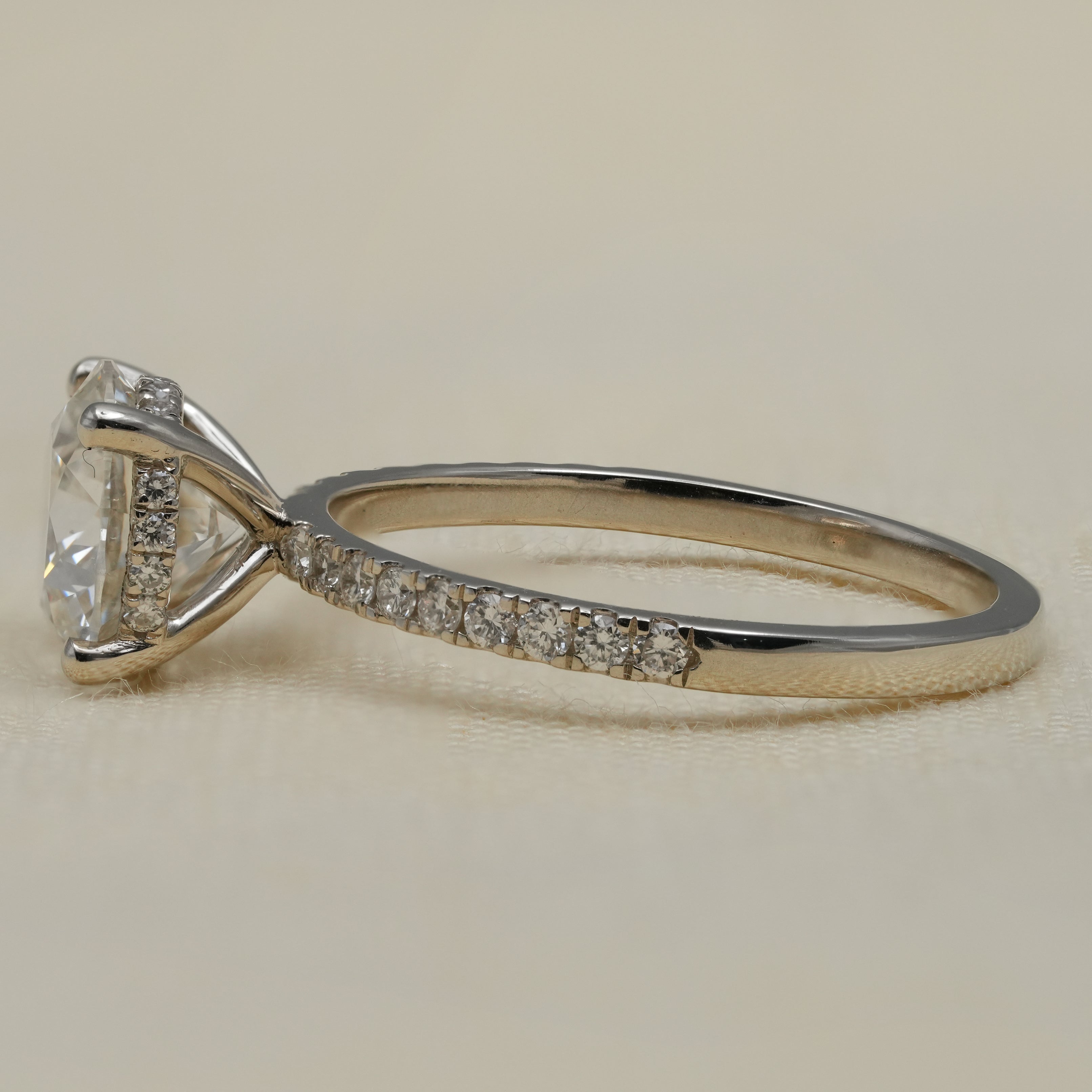 Elegant round lab grown diamond solitaire with side diamond accents