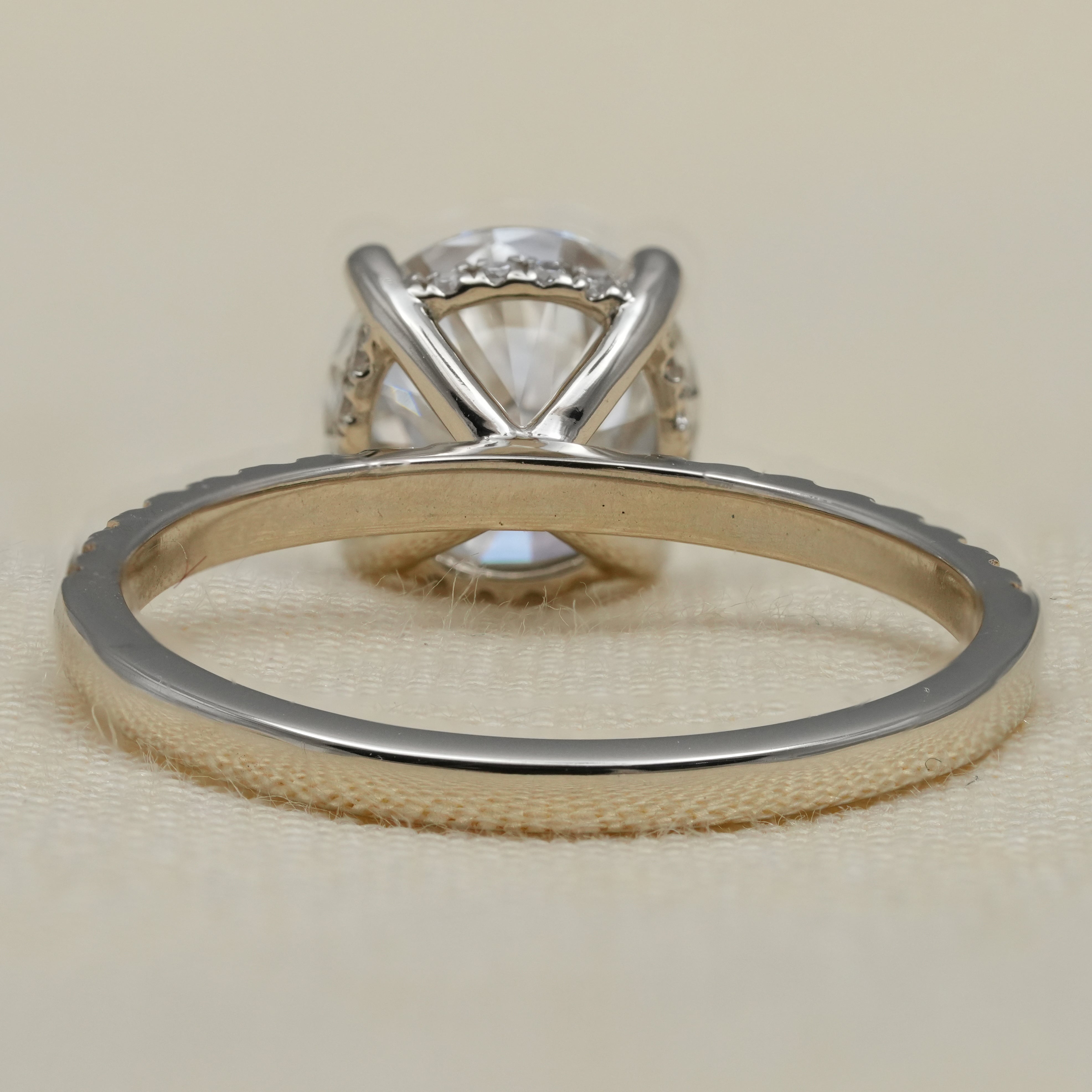 Round lab grown diamond ring with refined pavé shank design