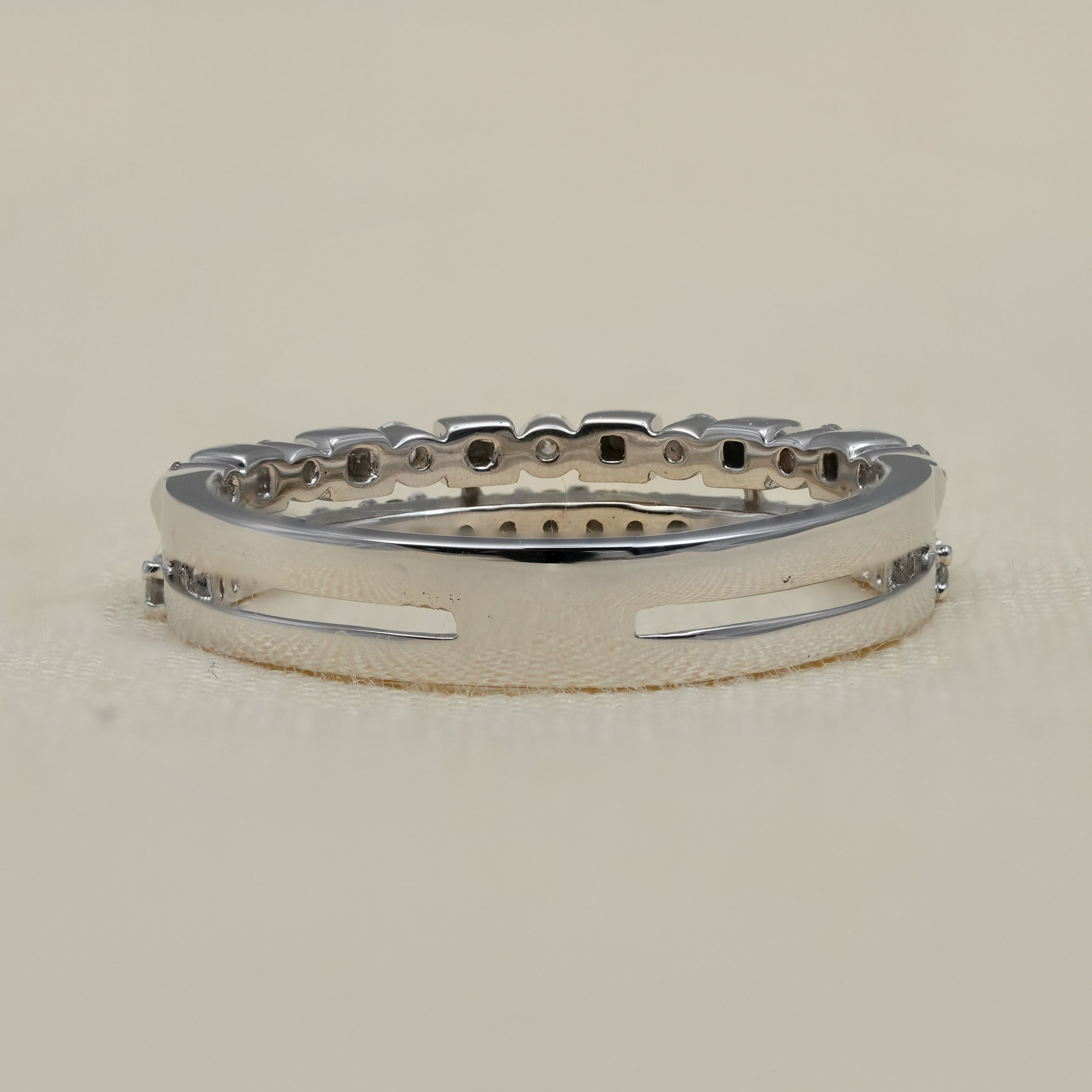 Slim white gold diamond ring with contemporary layered design