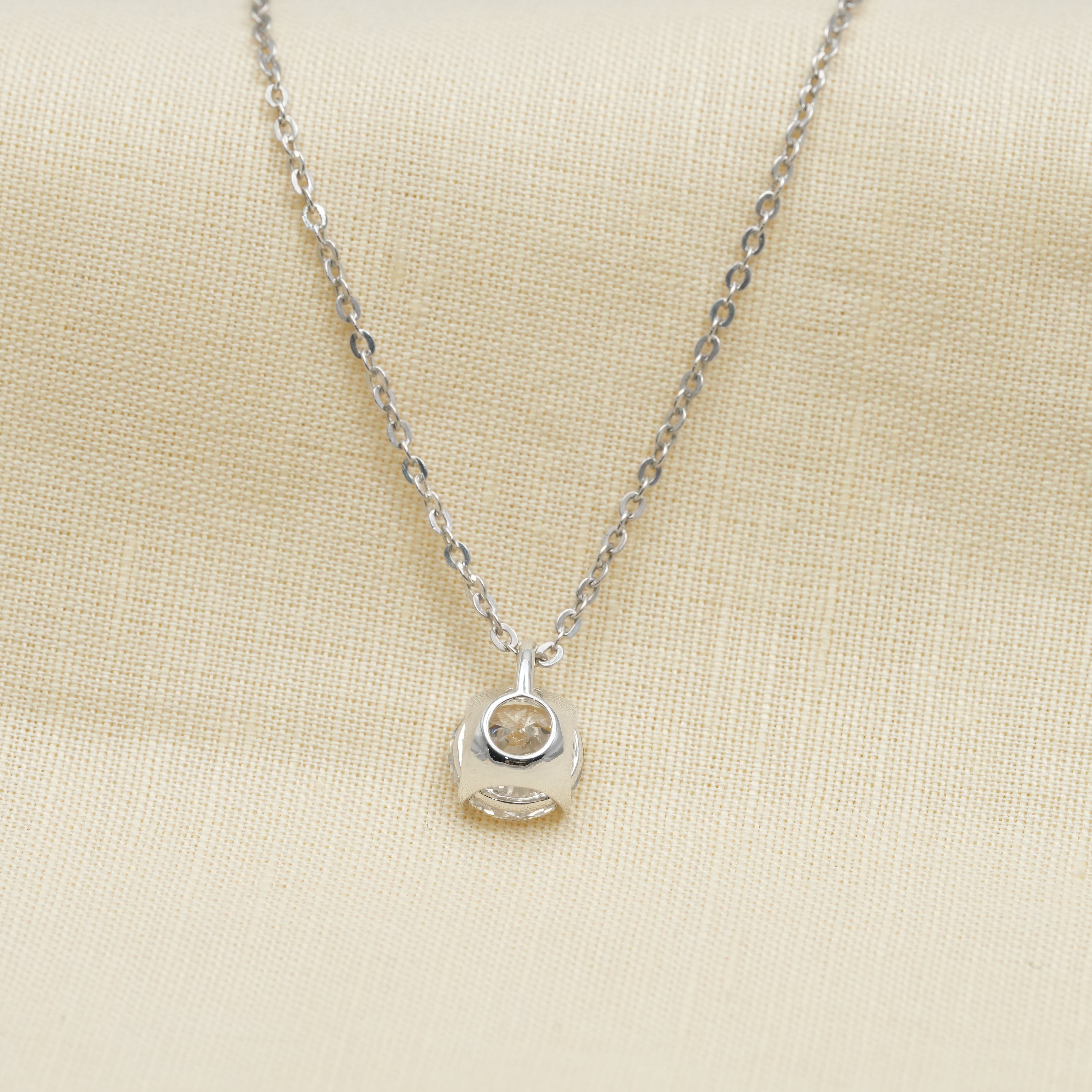 Minimal round necklace showcasing lab grown diamond on model