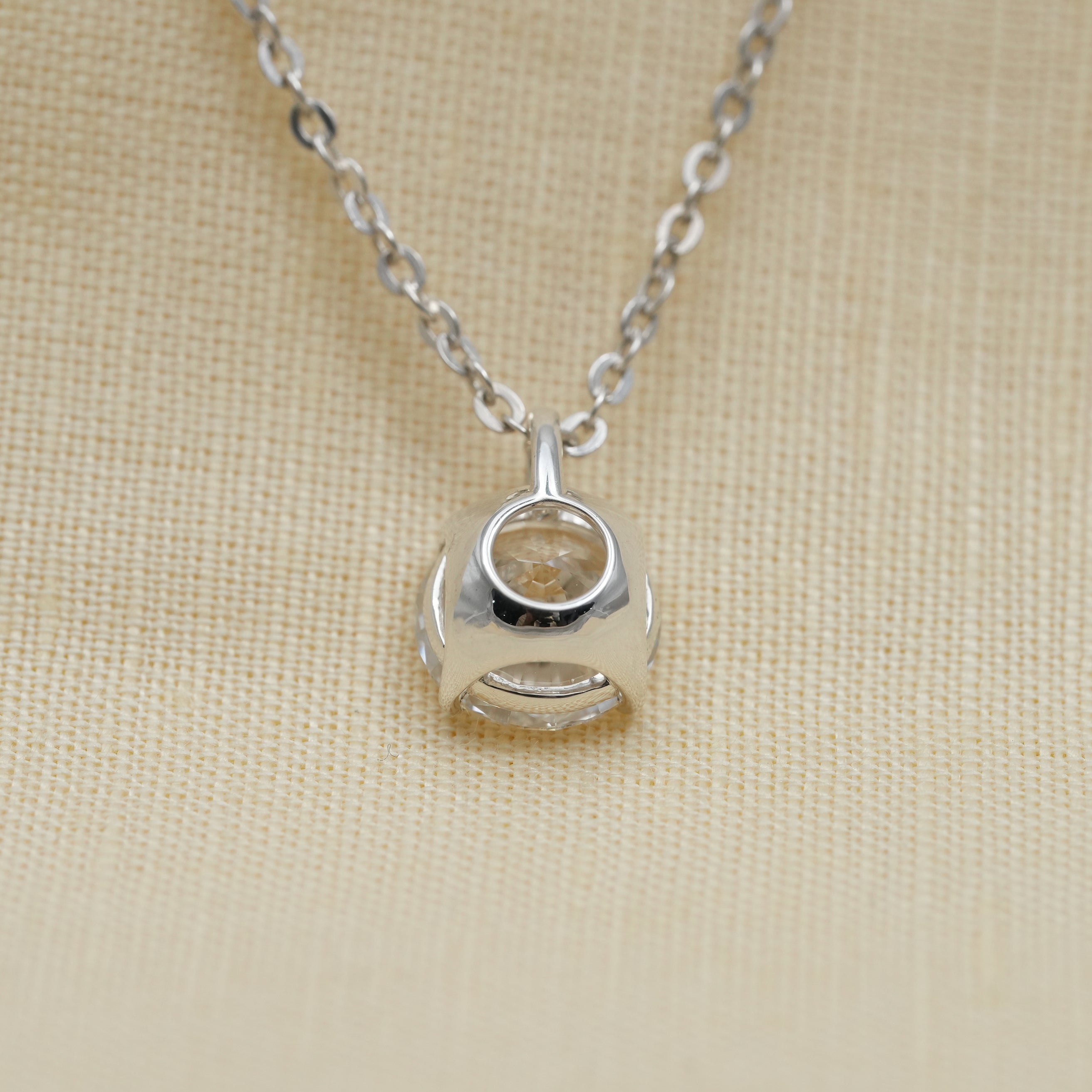 Classic solitaire necklace with lab grown diamond worn on neckline