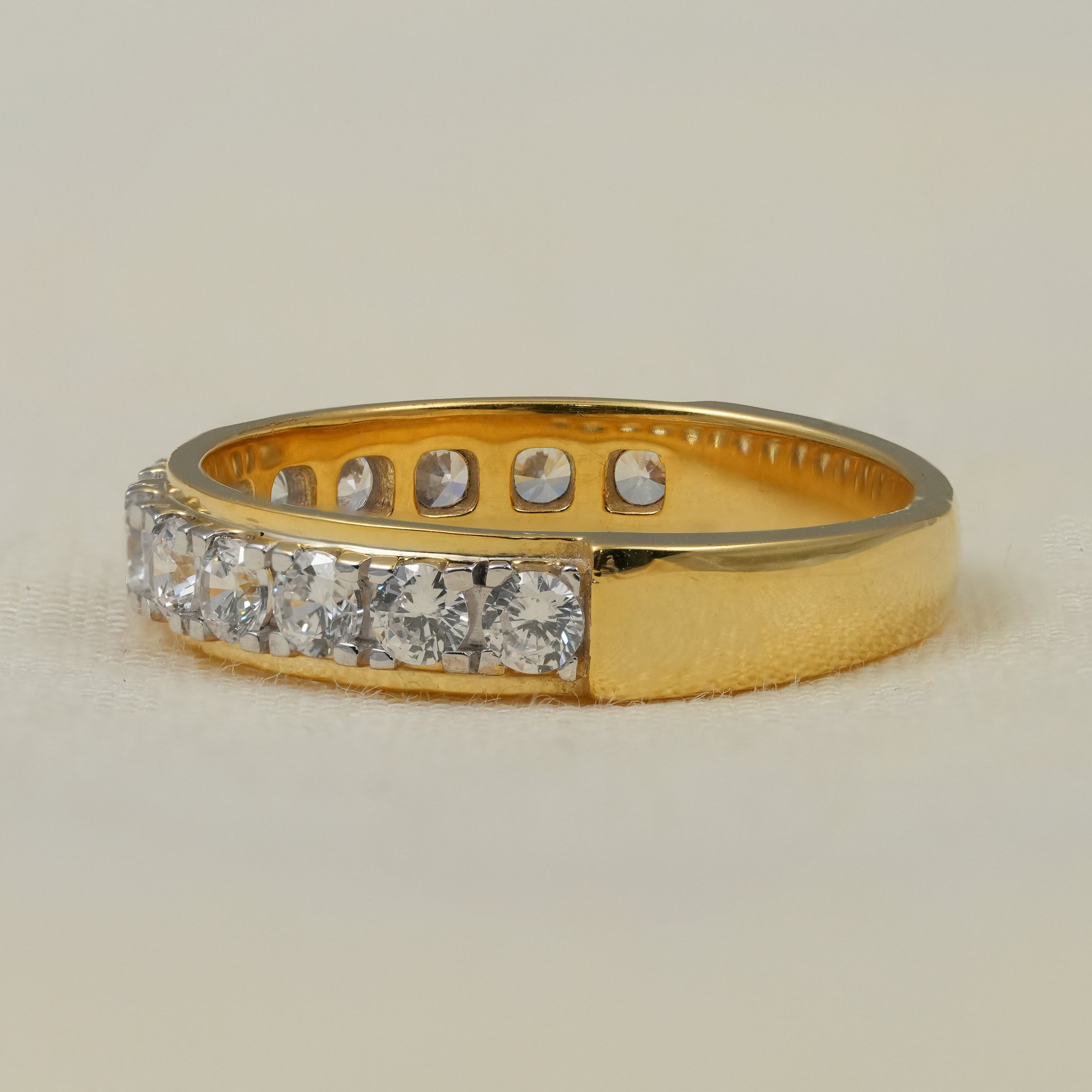 Yellow gold round lab grown diamond prong wedding band minimalist elegance