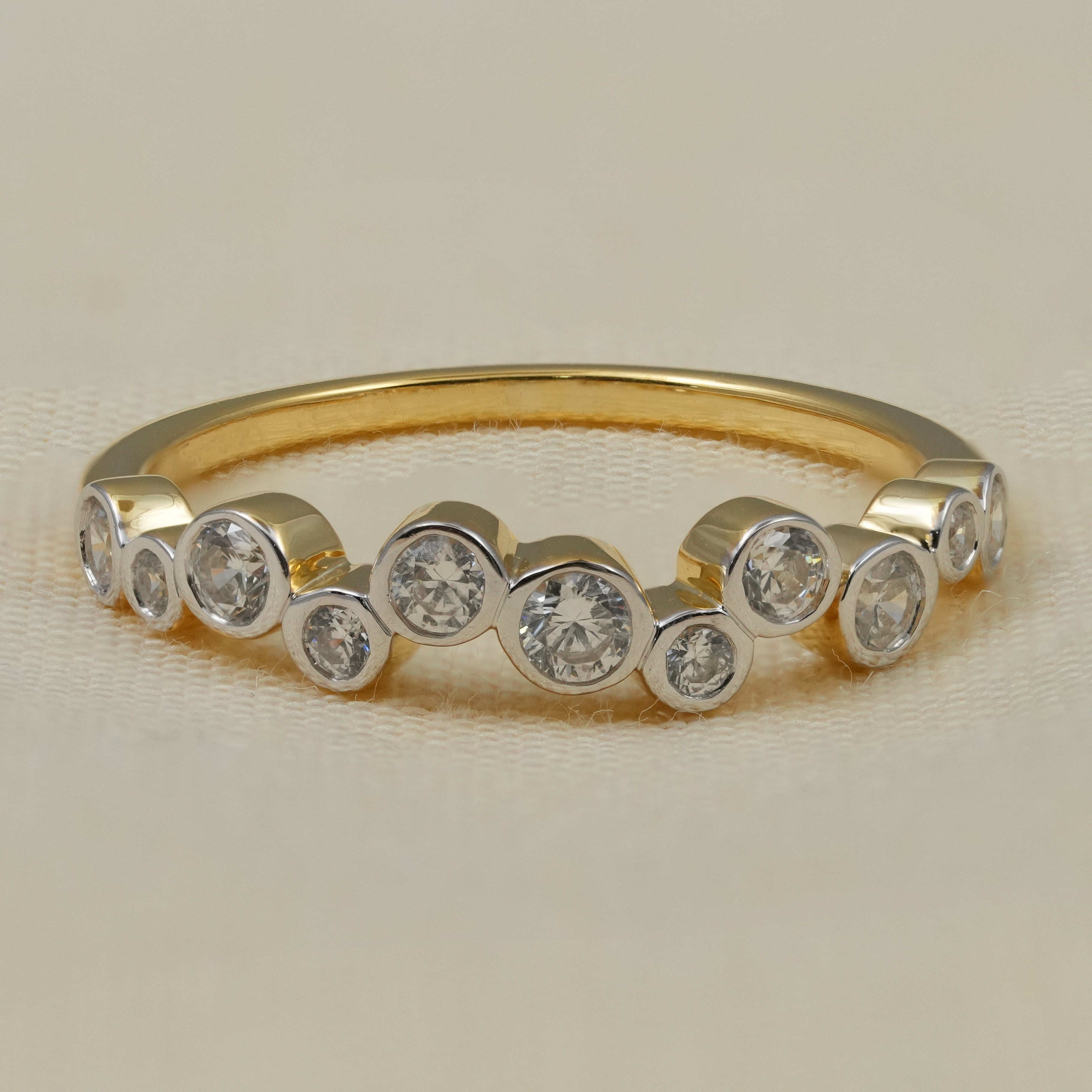 Yellow gold bezel set lab grown diamond bubble wedding band