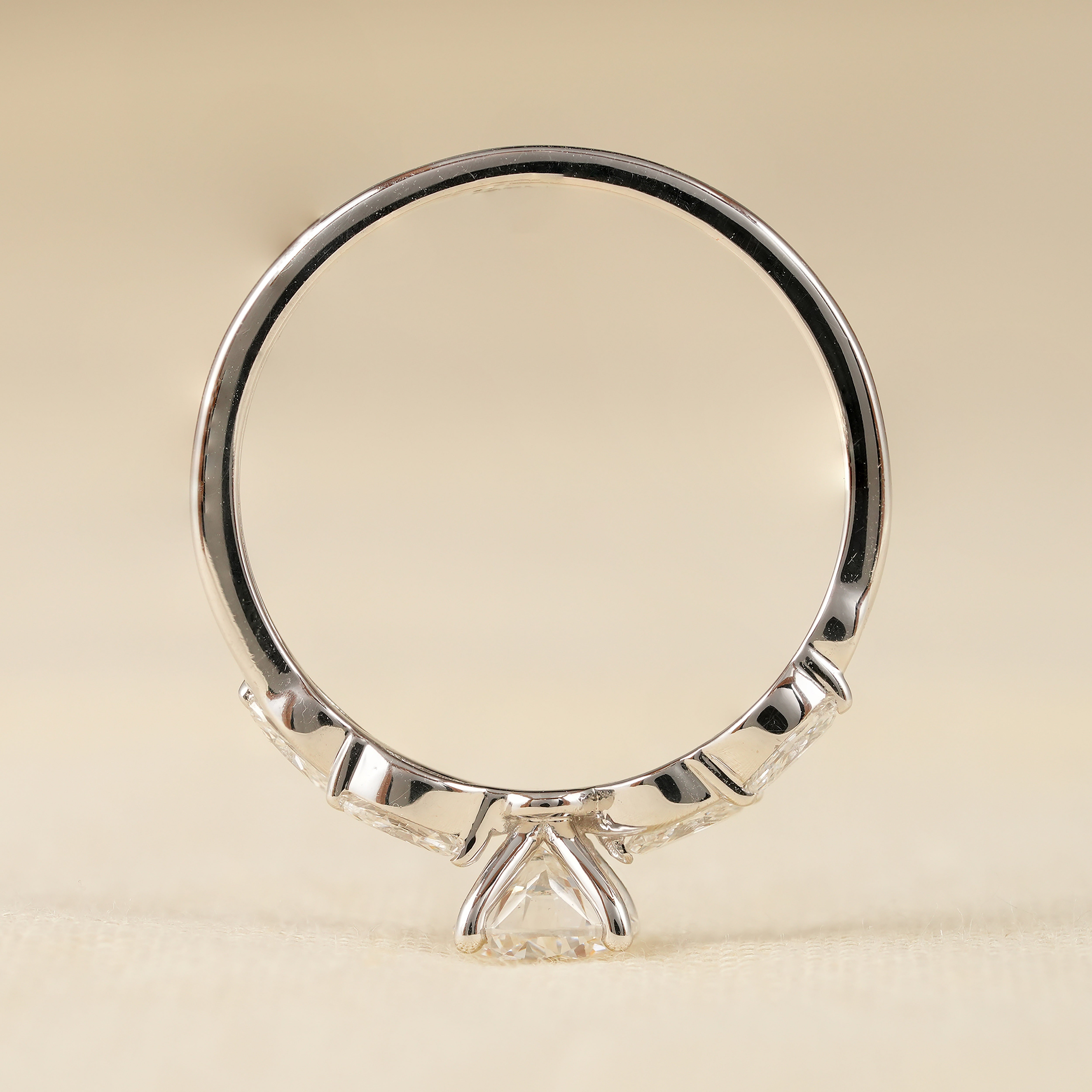 Round Solitaire Engagement Ring with Marquise Accent Diamond Band