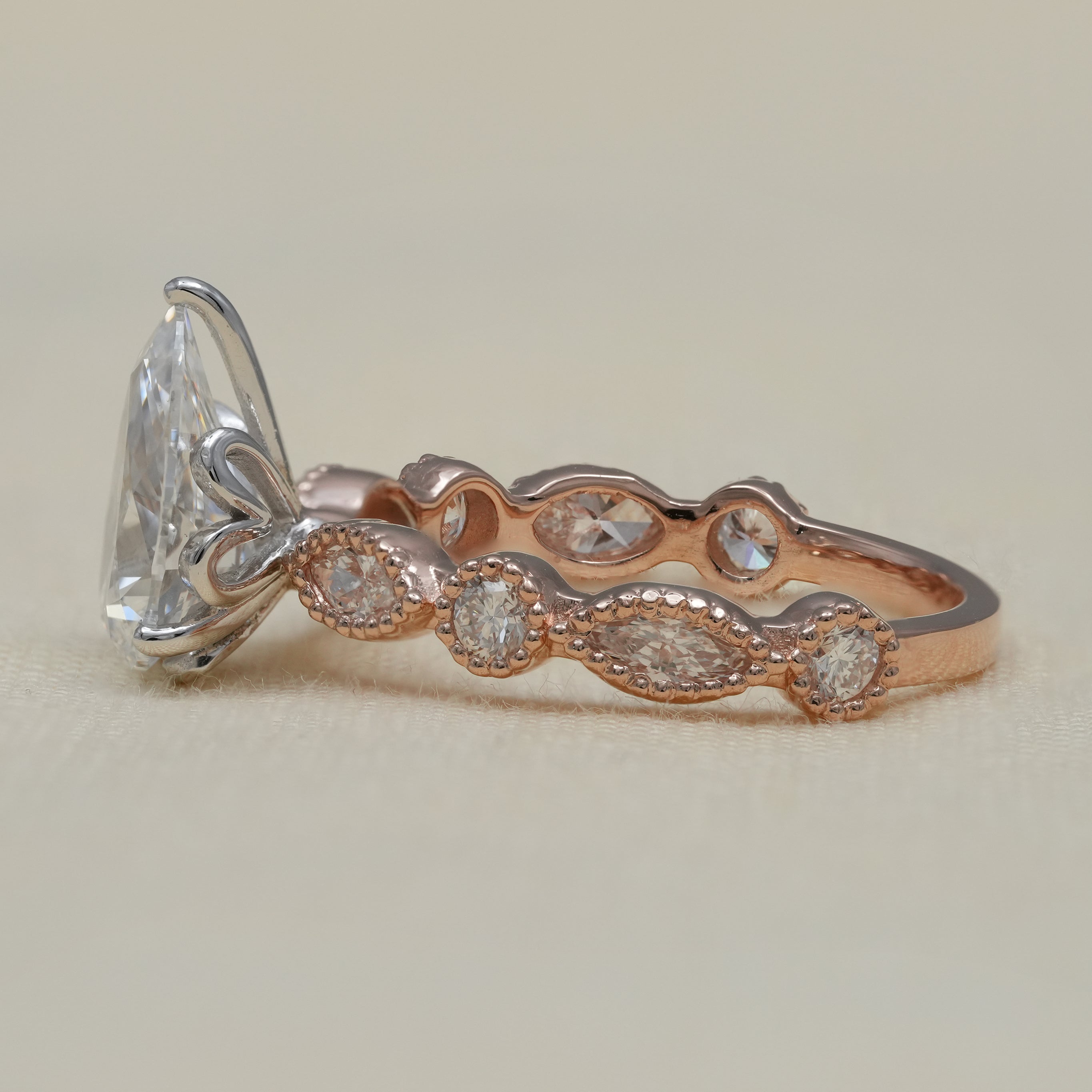 Elegant pear lab grown diamond ring with milgrain details