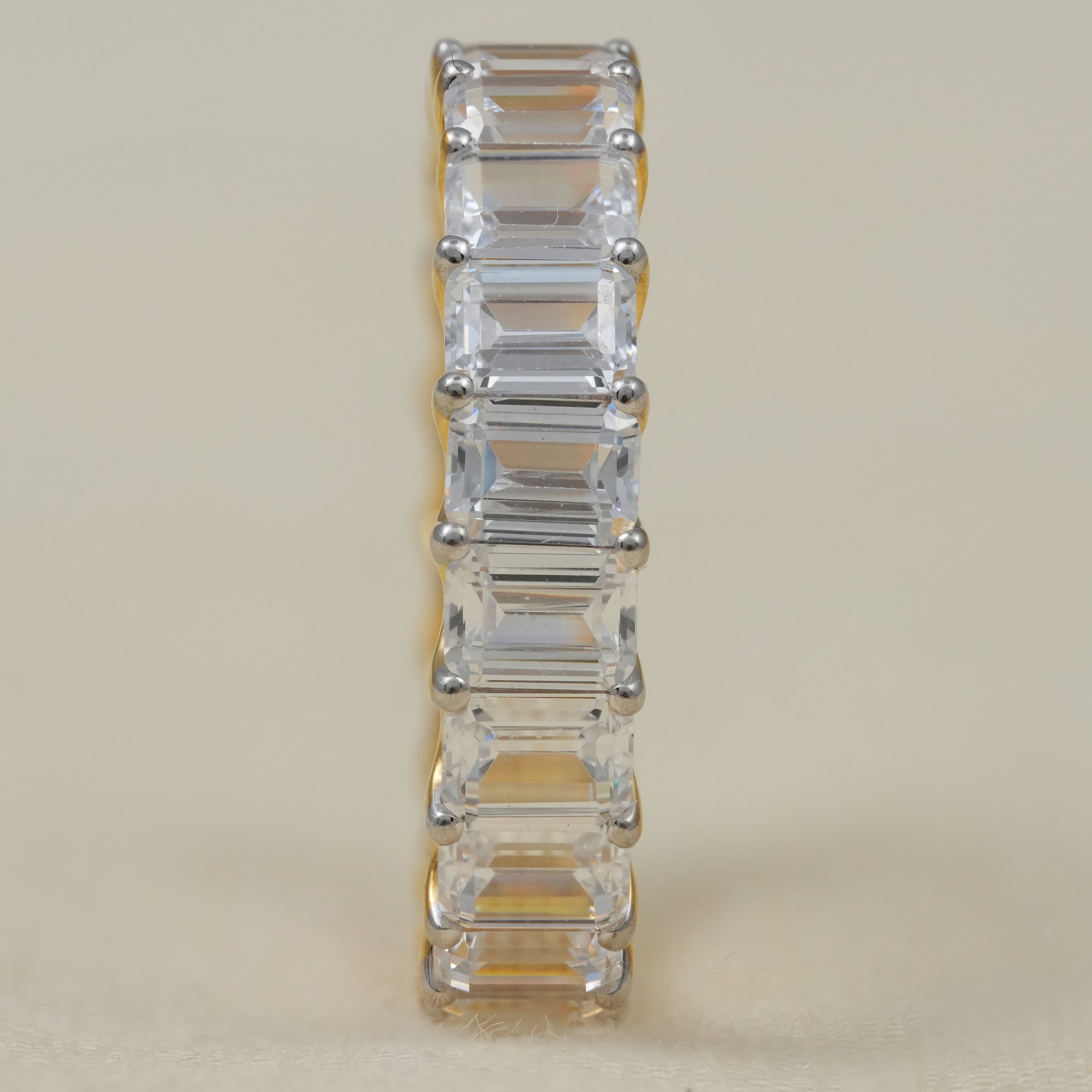 Luxury yellow gold emerald cut lab grown diamond eternity ring