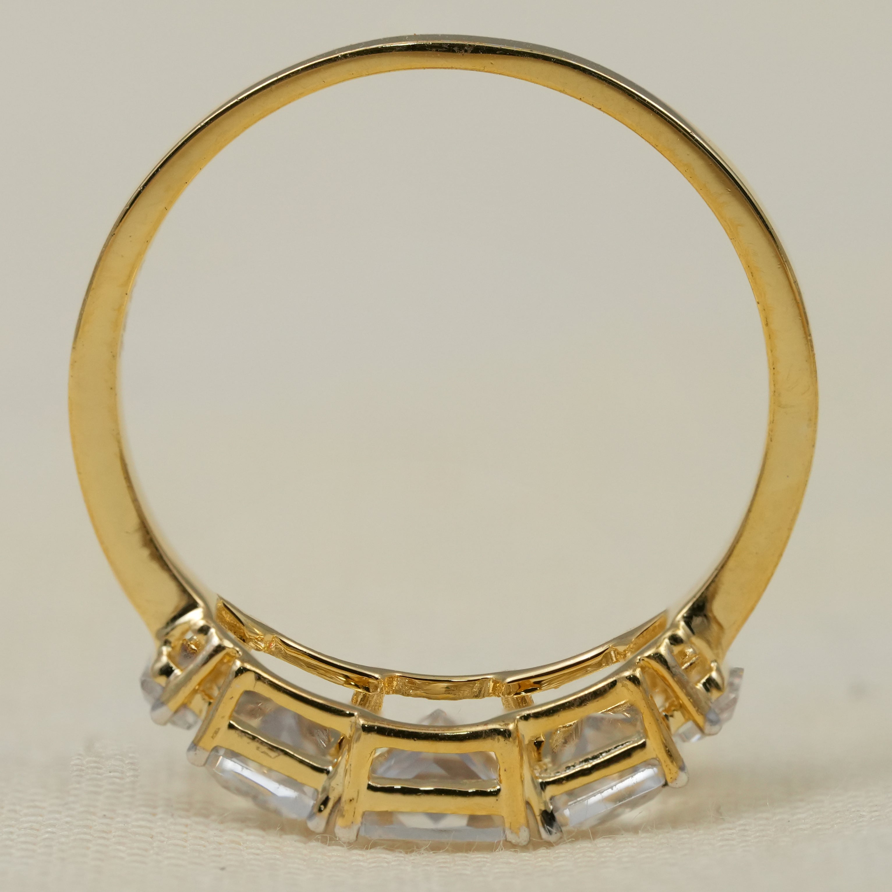 Elegant radiant three stone bridal ring featuring lab grown diamonds