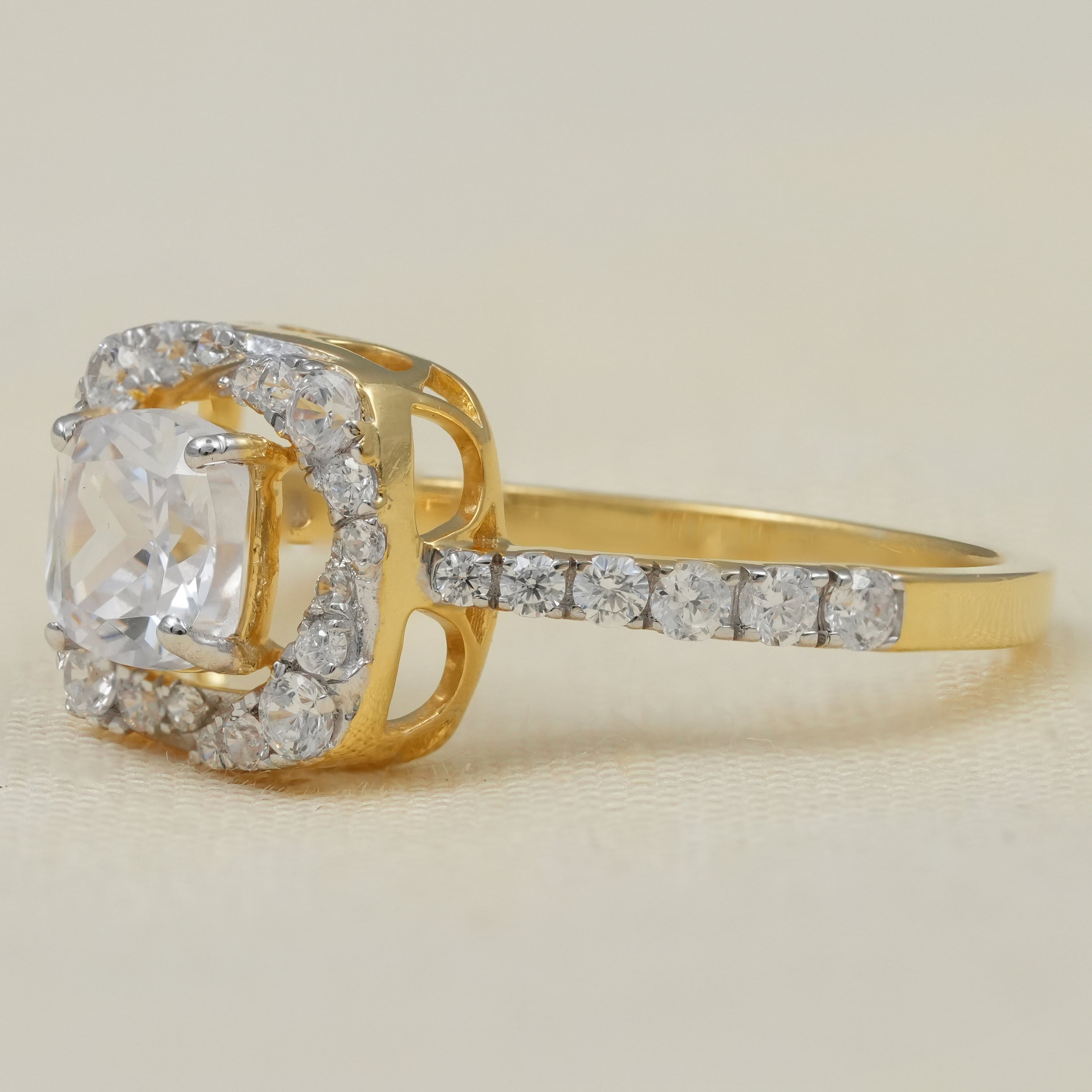 Round lab grown diamond halo bridal ring with pavé gold shank