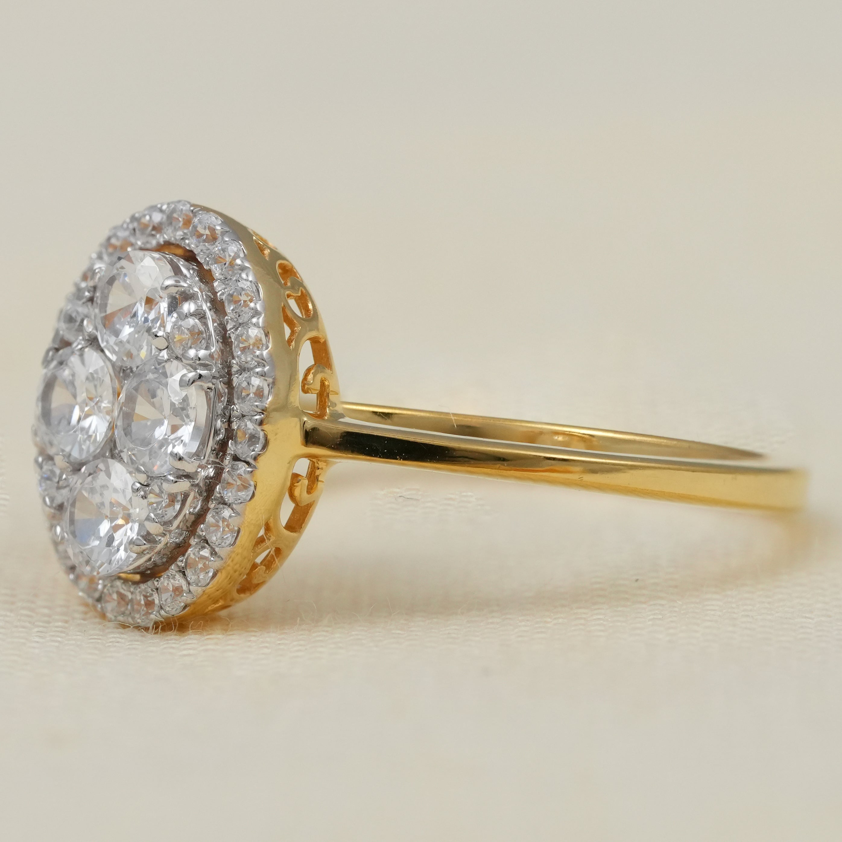 Oval lab grown diamond halo ring featuring floral cluster center design