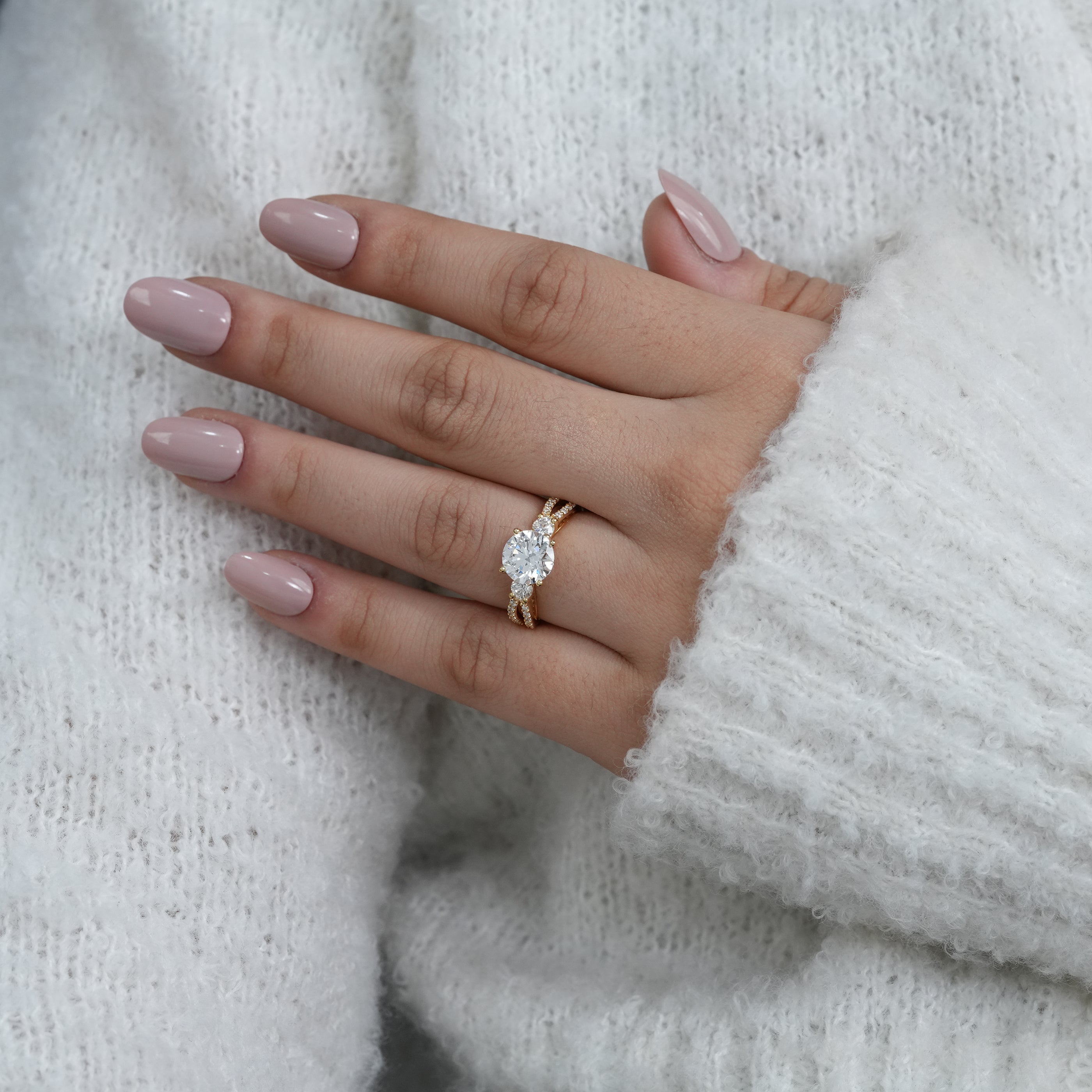 Elegant three stone lab grown diamond ring in yellow gold