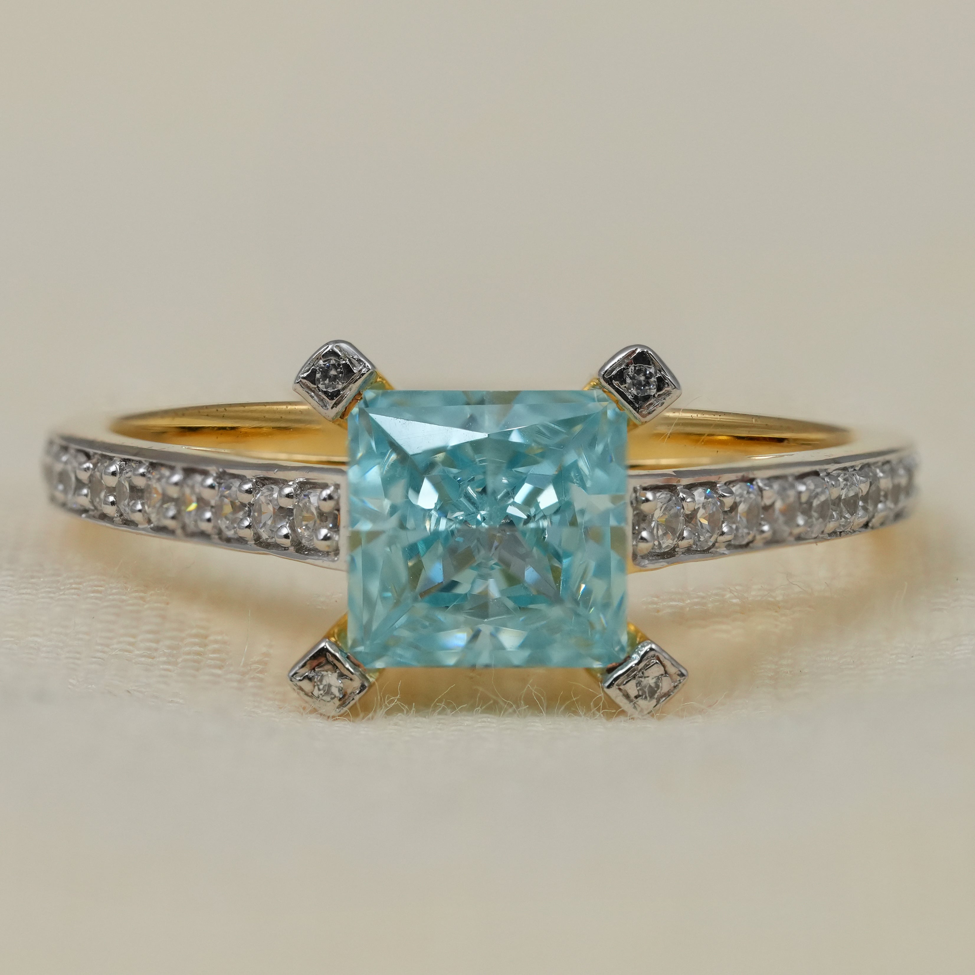 Princess cut lab grown diamond engagement ring with pavé yellow gold band