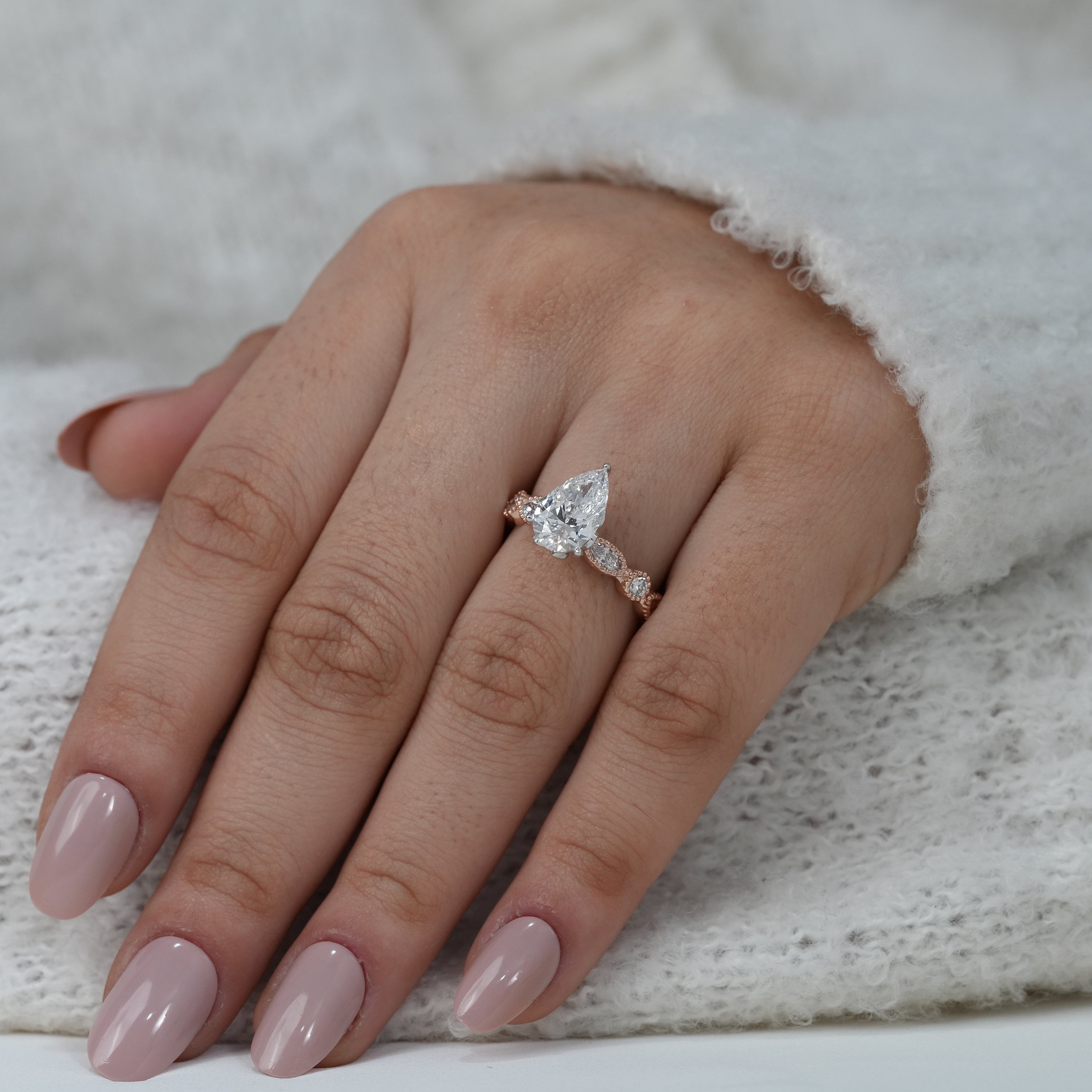 Luxury pear lab grown diamond ring with decorative band