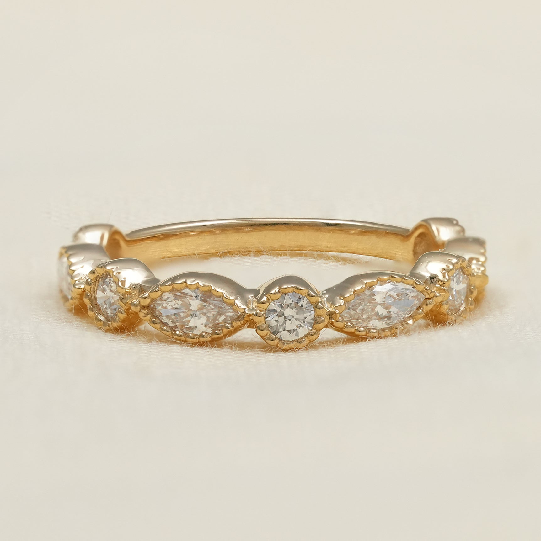 Marquise and round lab grown diamond wedding band in yellow gold