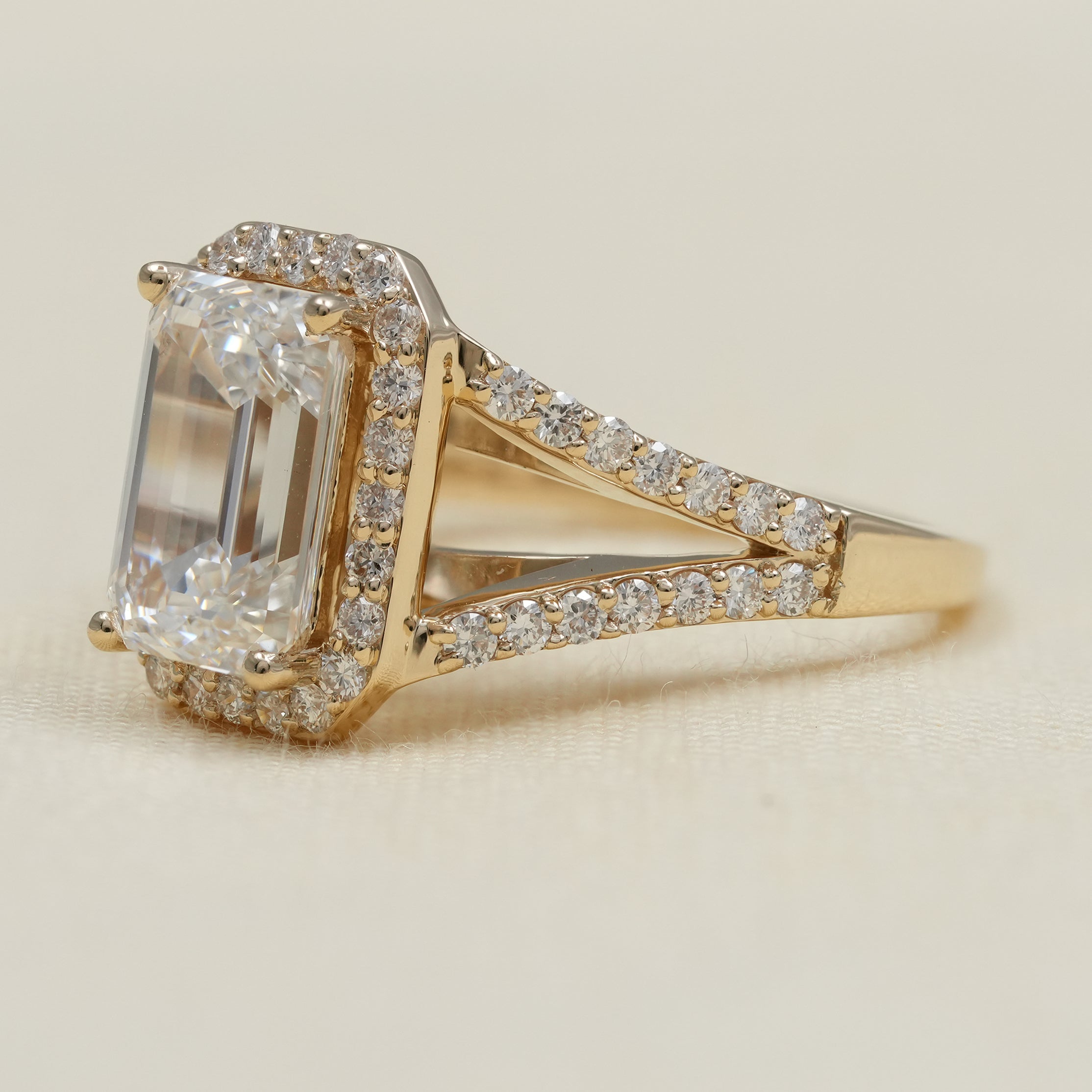 Emerald cut lab grown diamond ring with double band detail