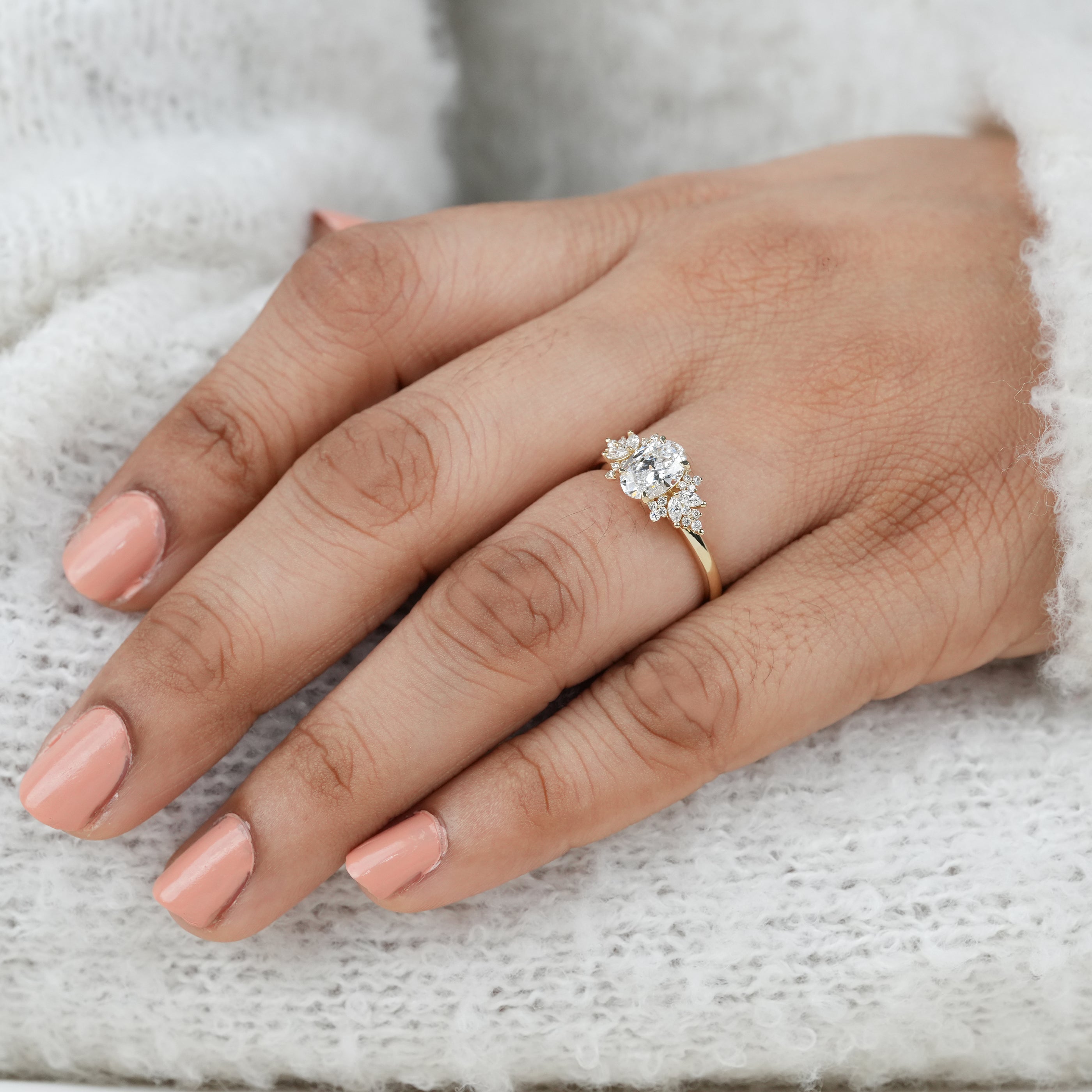 Statement oval lab grown diamond ring with intricate gold setting