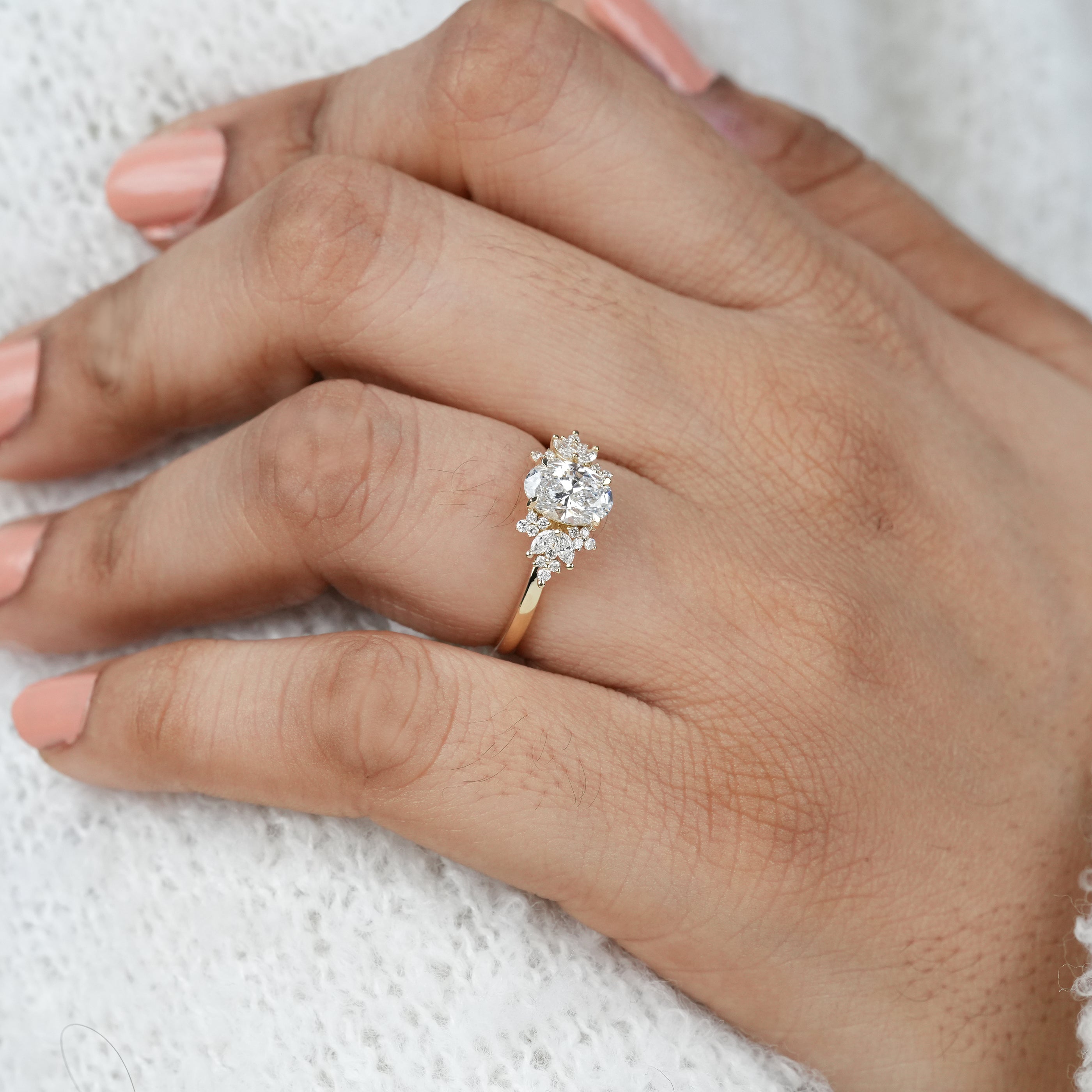 Vintage inspired oval lab grown diamond ring with decorative petals