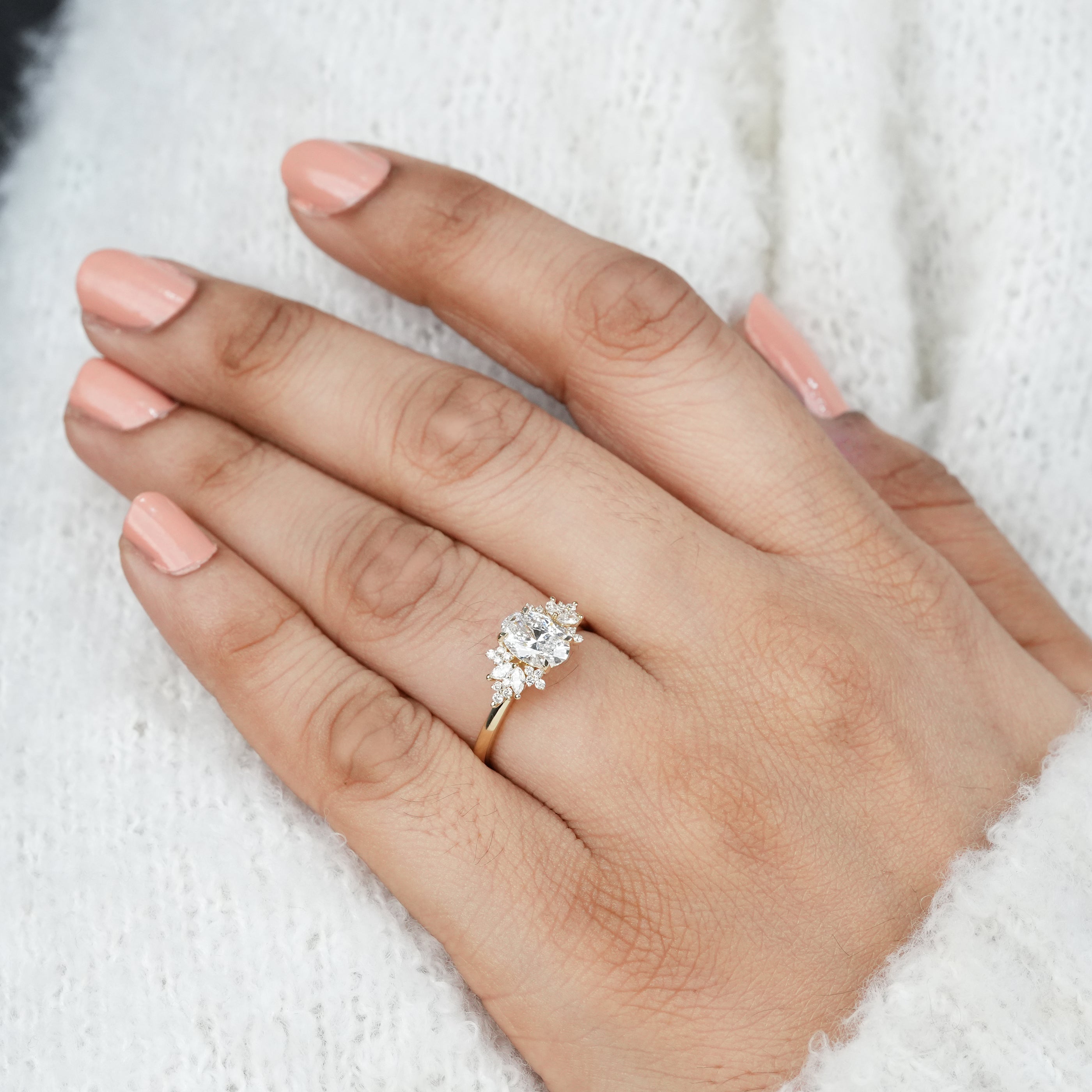 Romantic oval lab grown diamond engagement ring with cluster setting