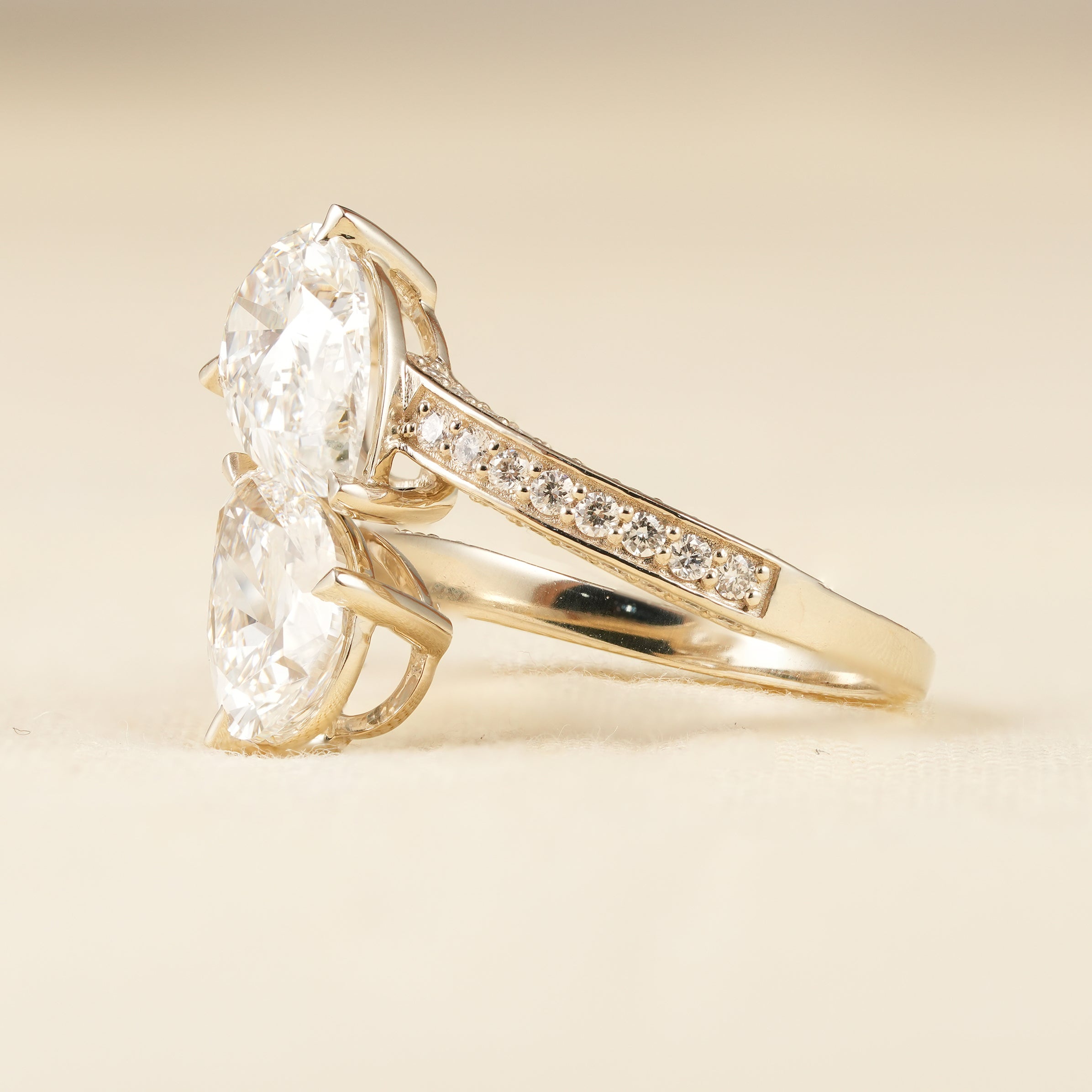 Modern Bypass Engagement Ring with Pear Shaped Lab Diamonds