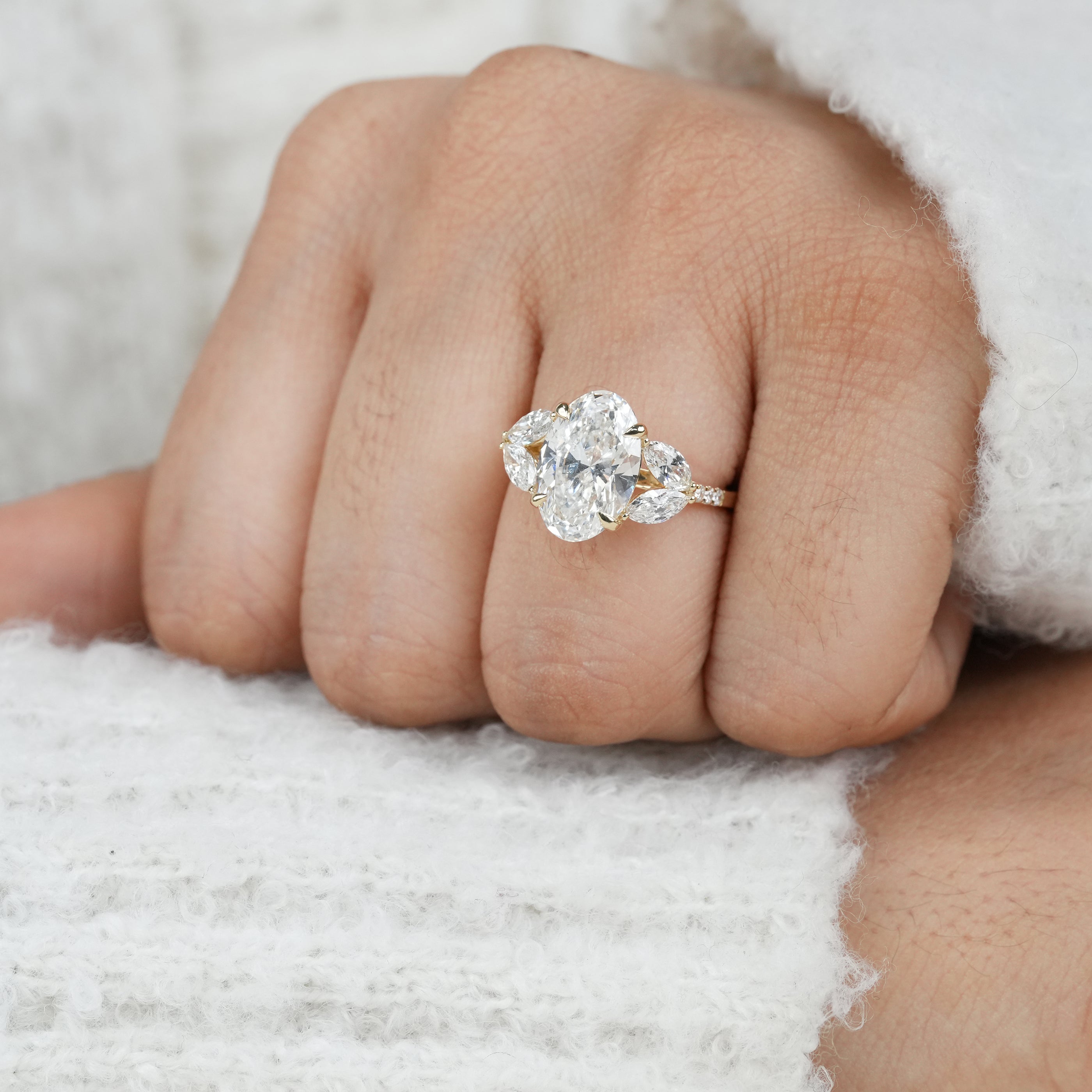 Designer oval lab grown diamond ring with elegant gold setting