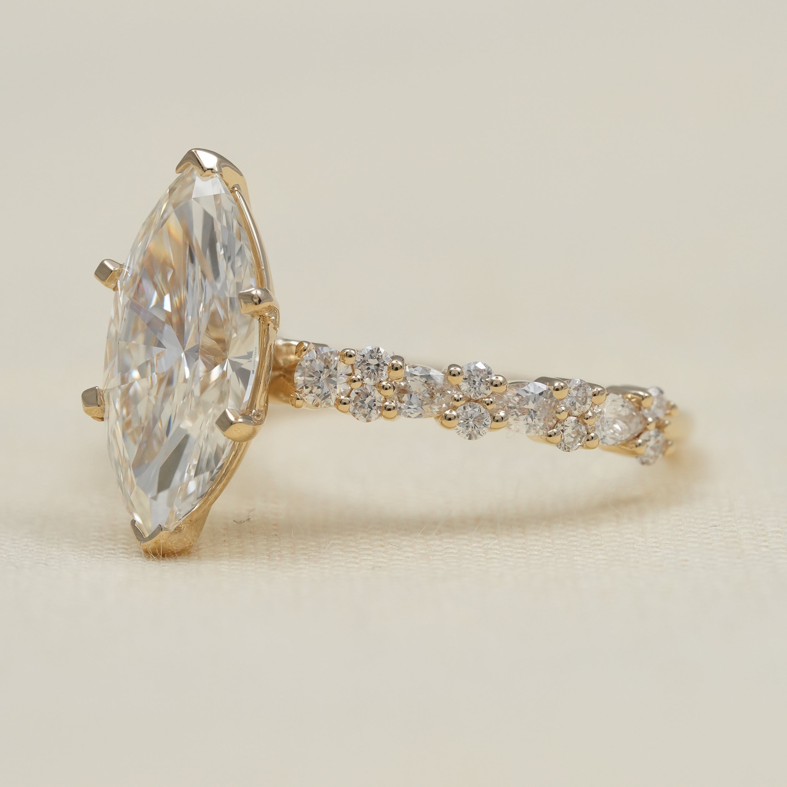 Marquise lab grown diamond solitaire with sparkling side stones