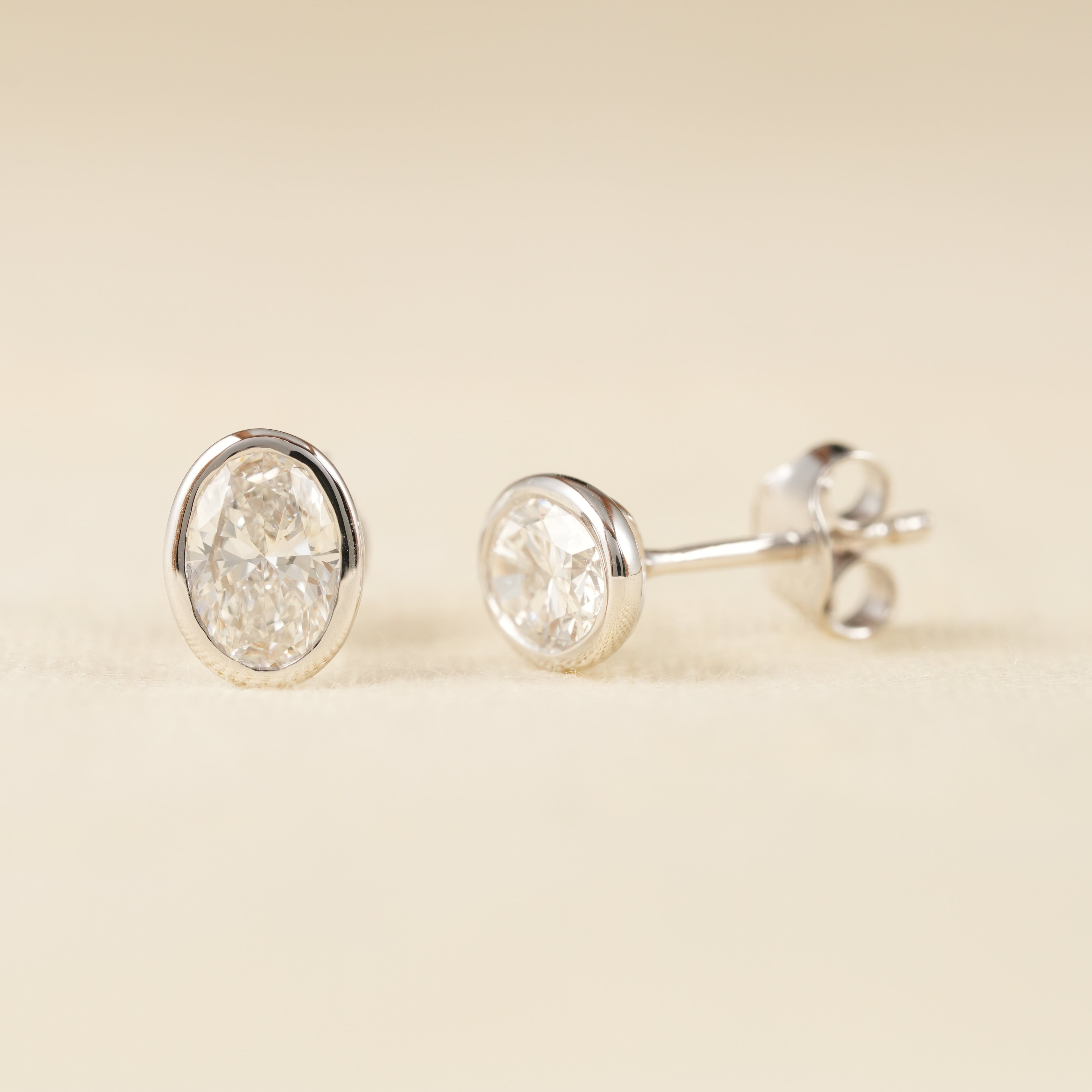 Classic Oval Lab Diamond Bezel Stud Earrings in White Gold