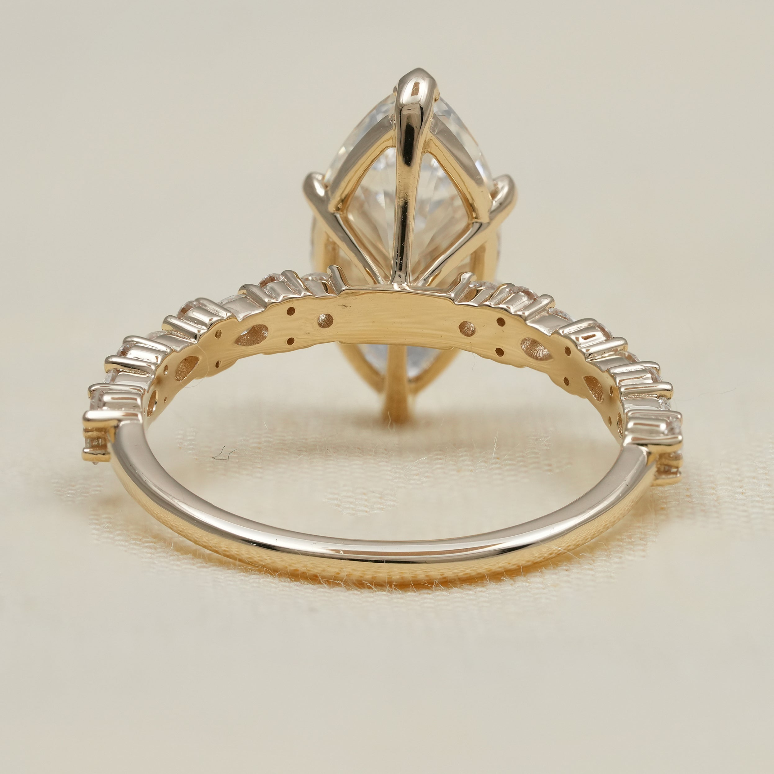 Marquise lab grown diamond ring with round accent diamonds