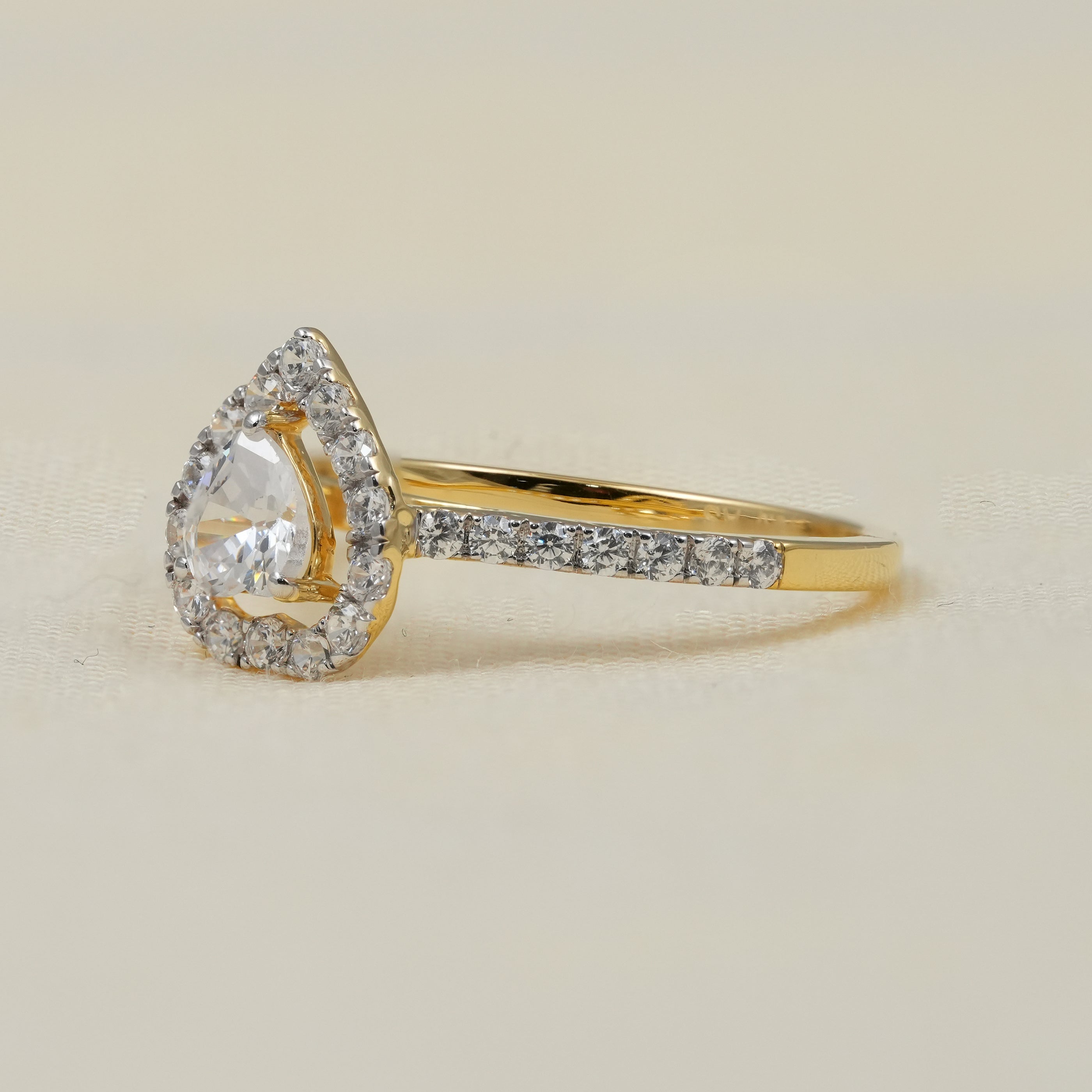 Yellow gold heart lab grown diamond halo ring with sparkling pavé shank