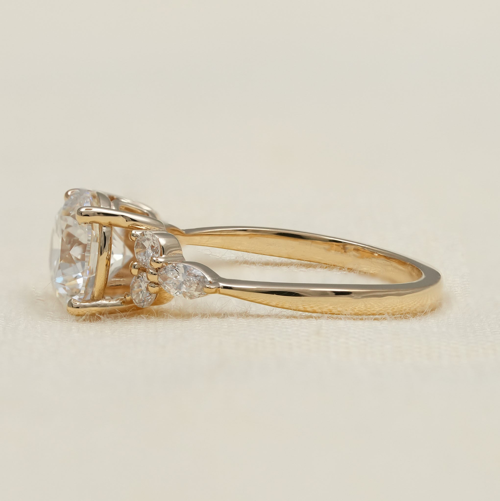 Elegant round lab grown diamond engagement ring with side cluster