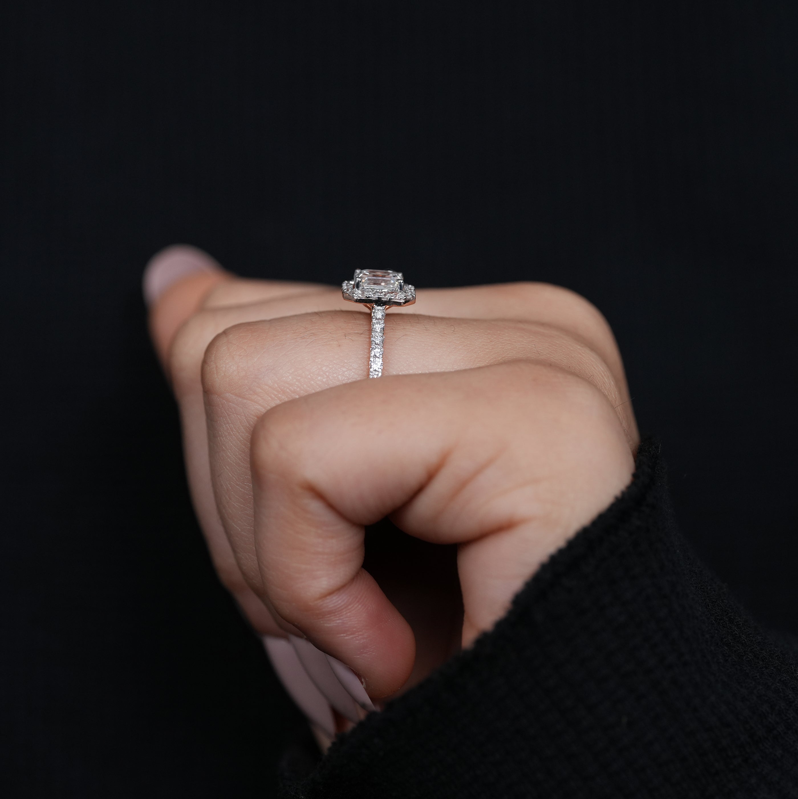 Timeless emerald cut halo ring highlighting a brilliant lab grown diamond