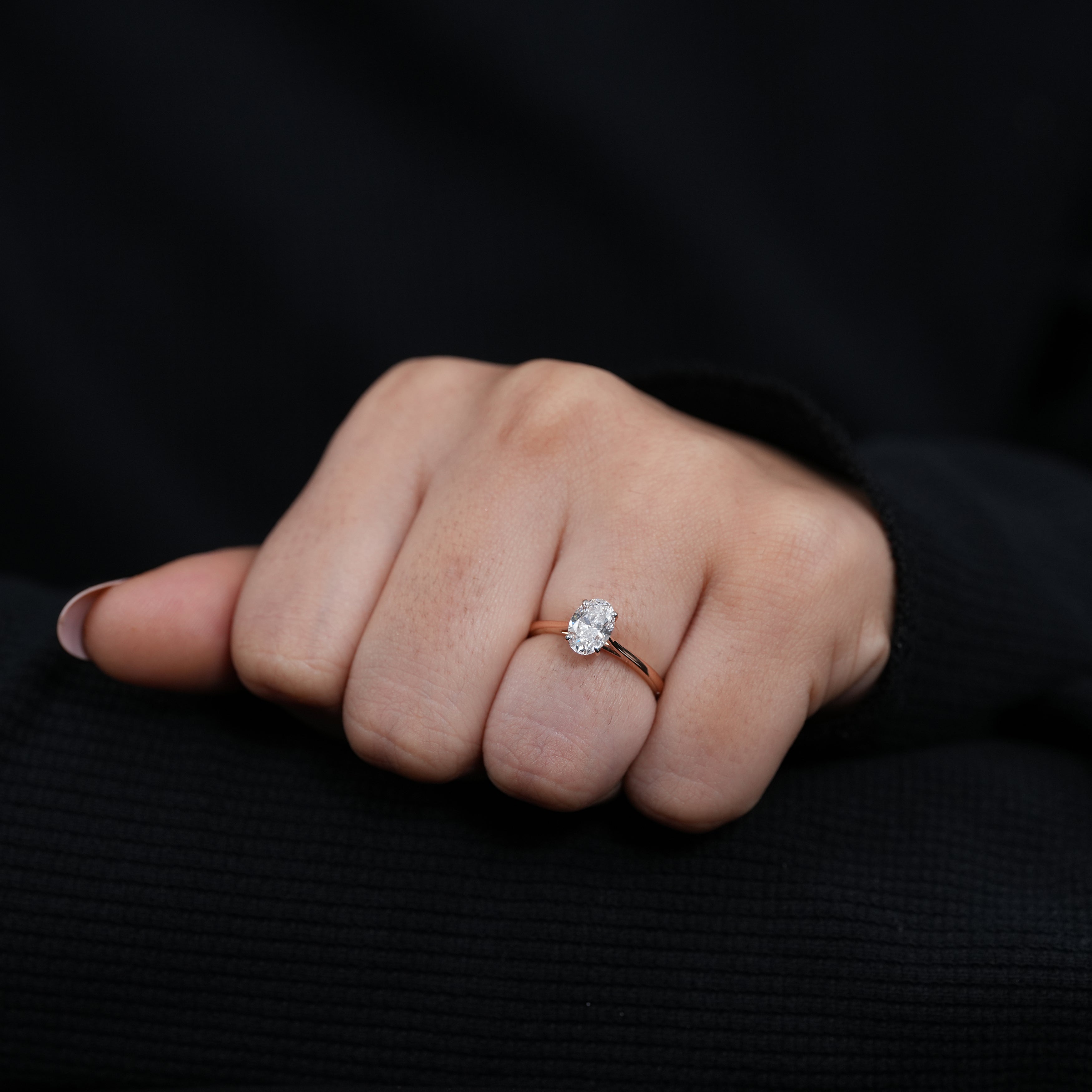 Delicate oval solitaire ring highlighting lab grown diamond elegance