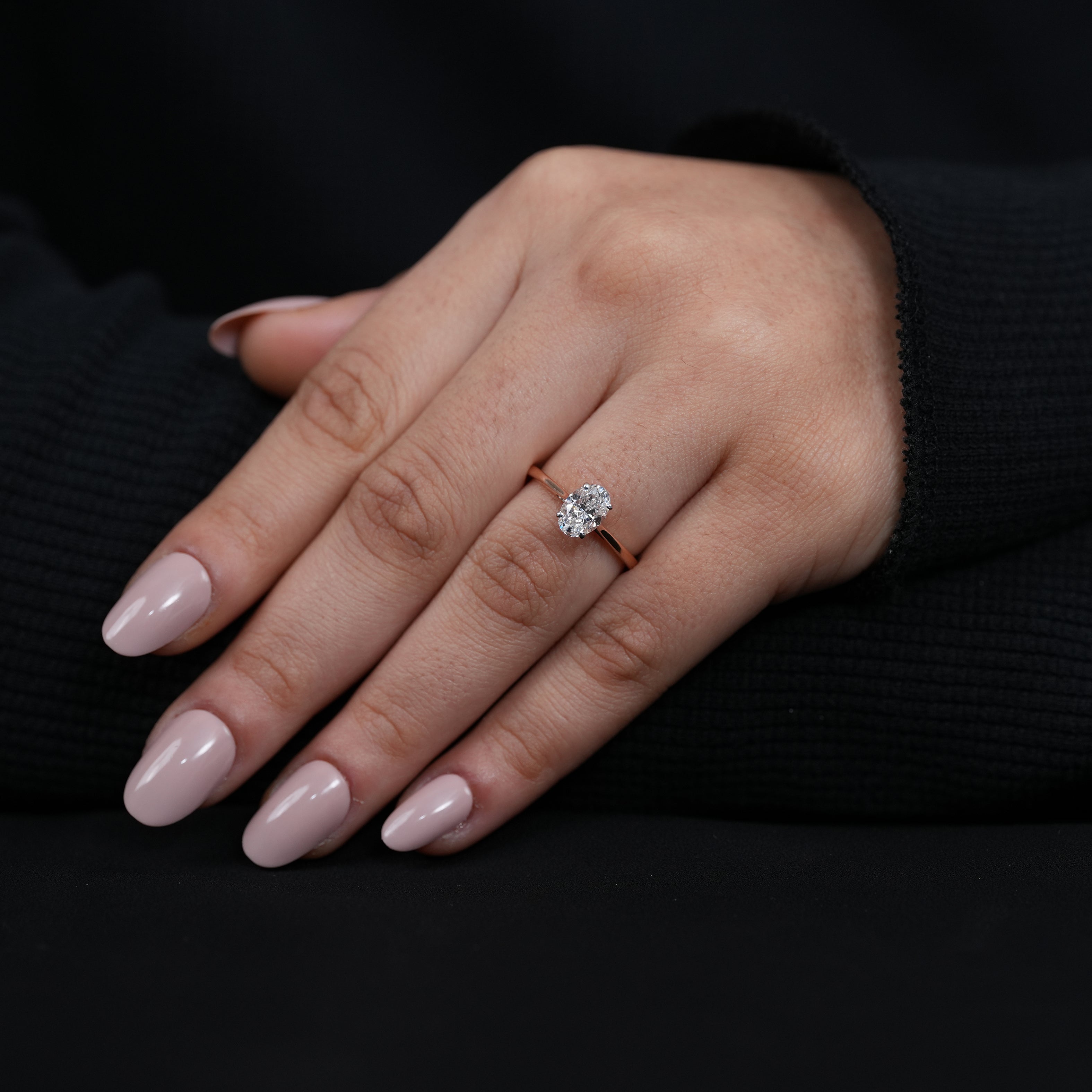 Oval cut solitaire engagement ring designed with sparkling lab grown diamond