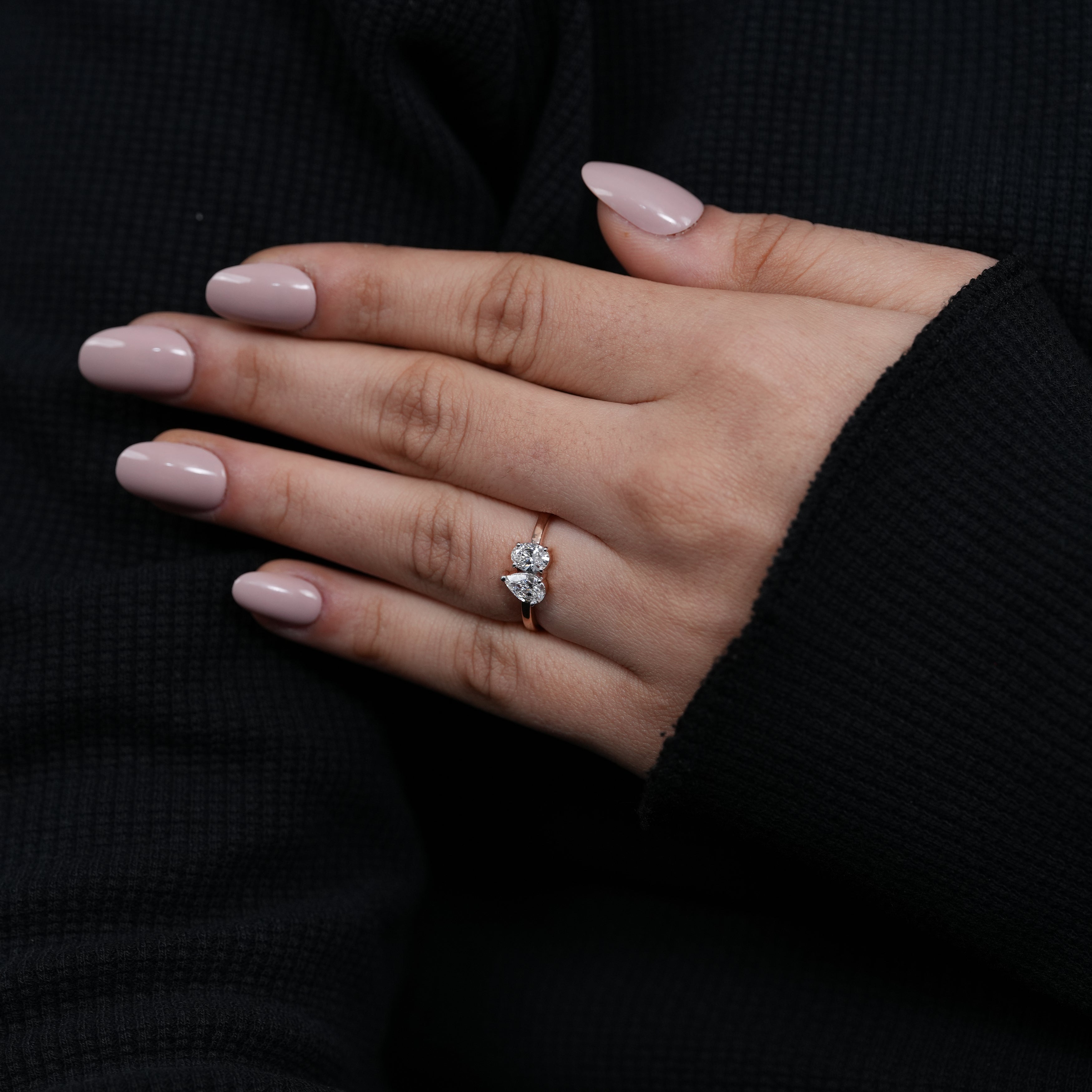 Unique toi et moi ring highlighting pear and oval lab grown diamonds