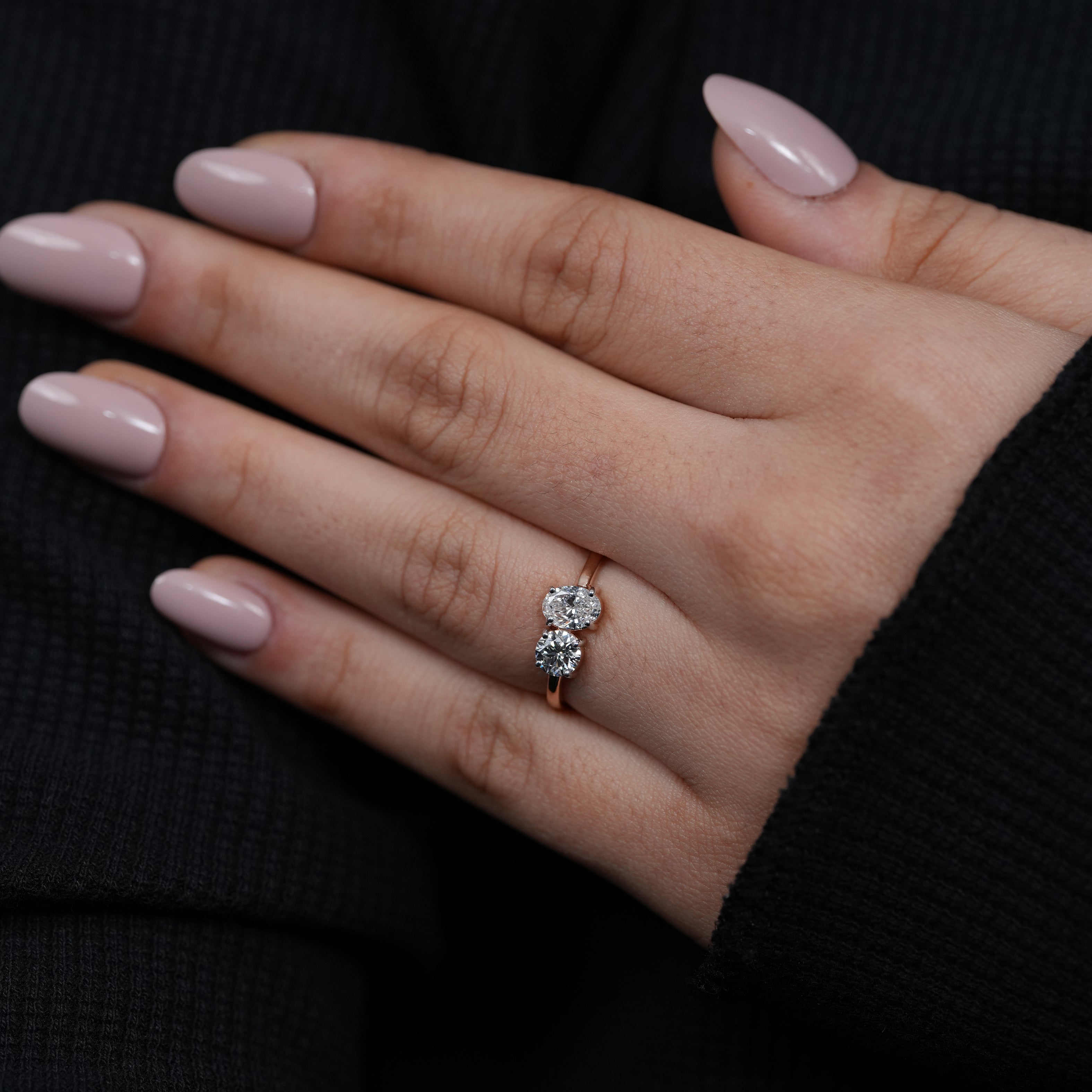 Unique two stone ring highlighting oval and round lab grown diamonds