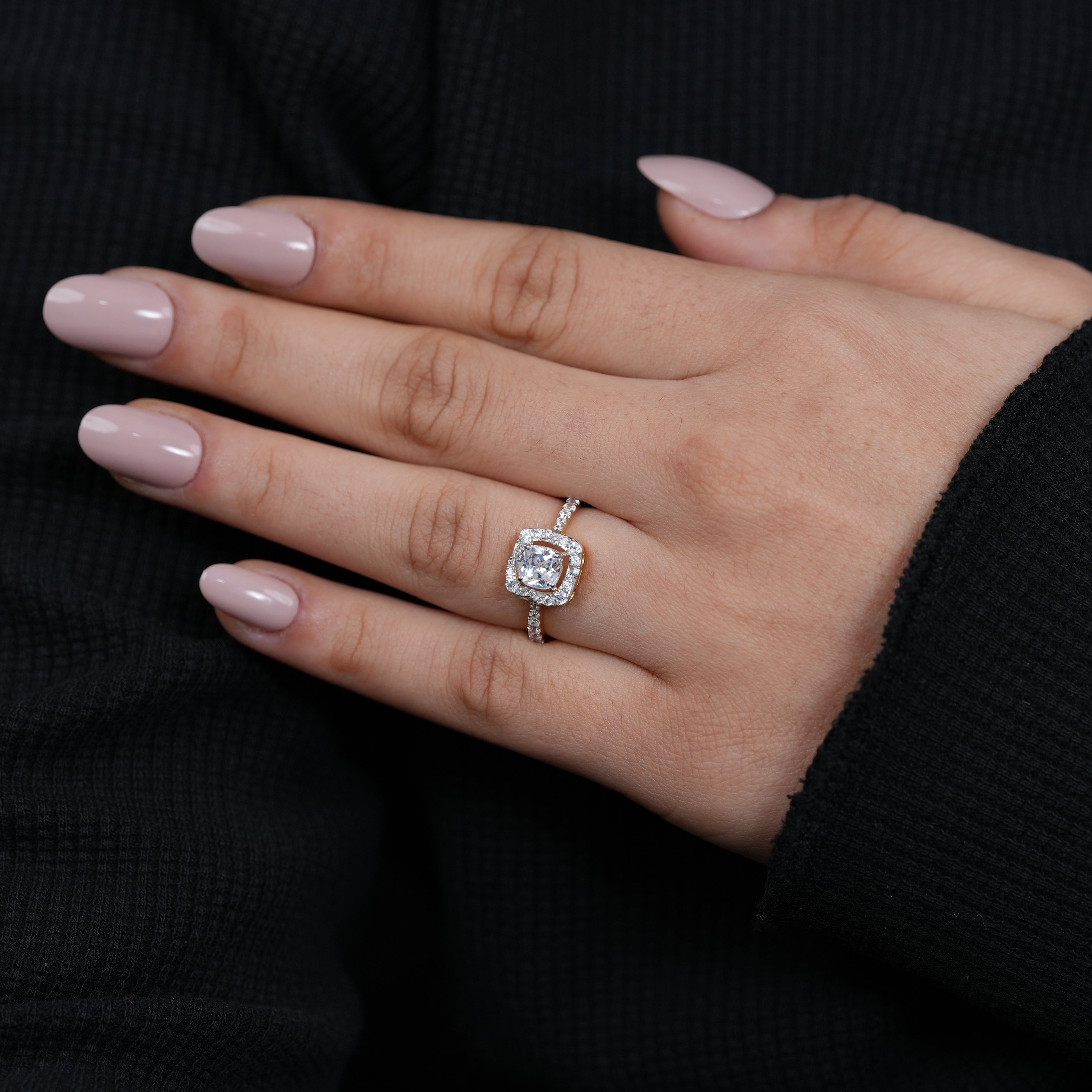 Elegant round diamond halo engagement ring in polished yellow gold