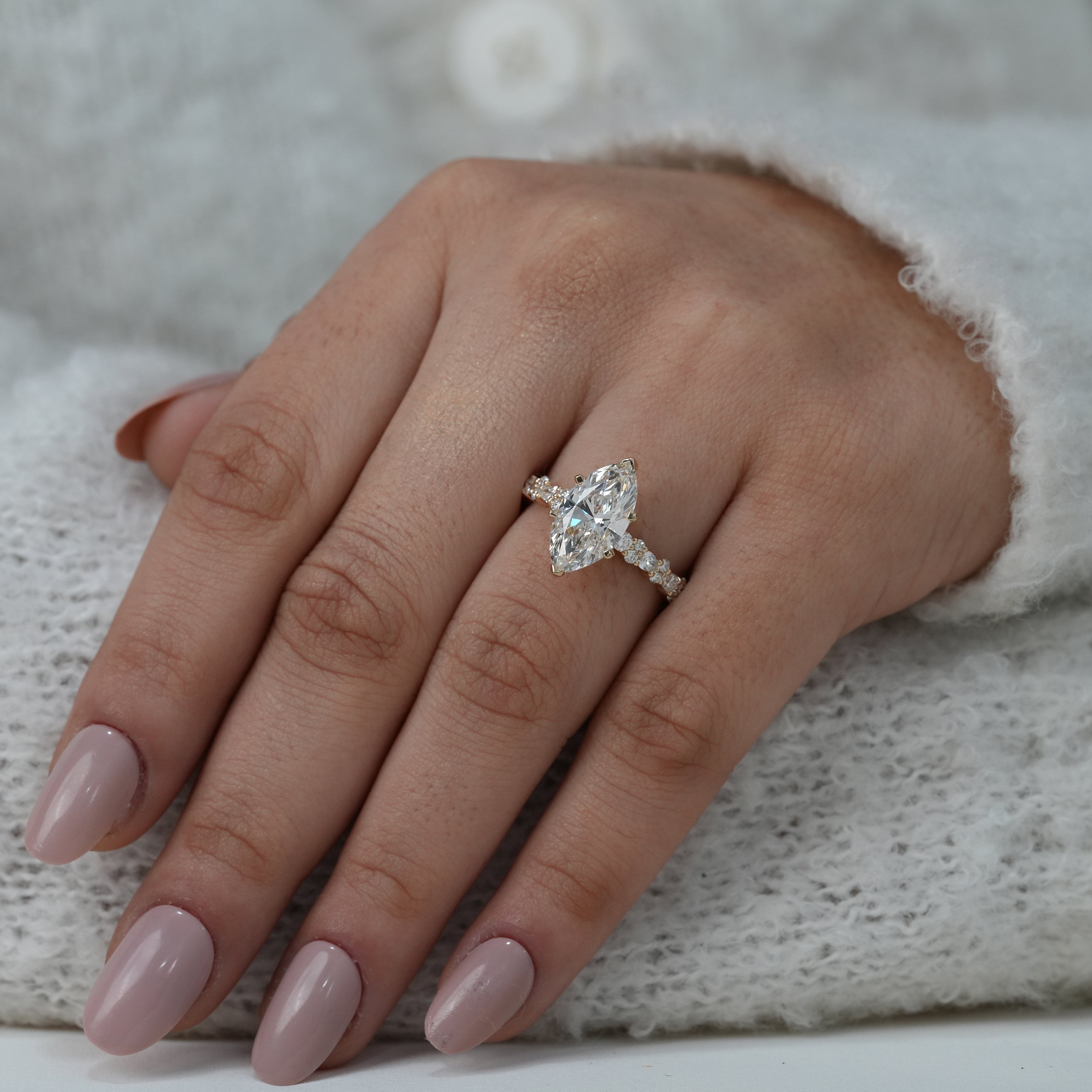 Marquise lab grown diamond bridal ring with accent stones