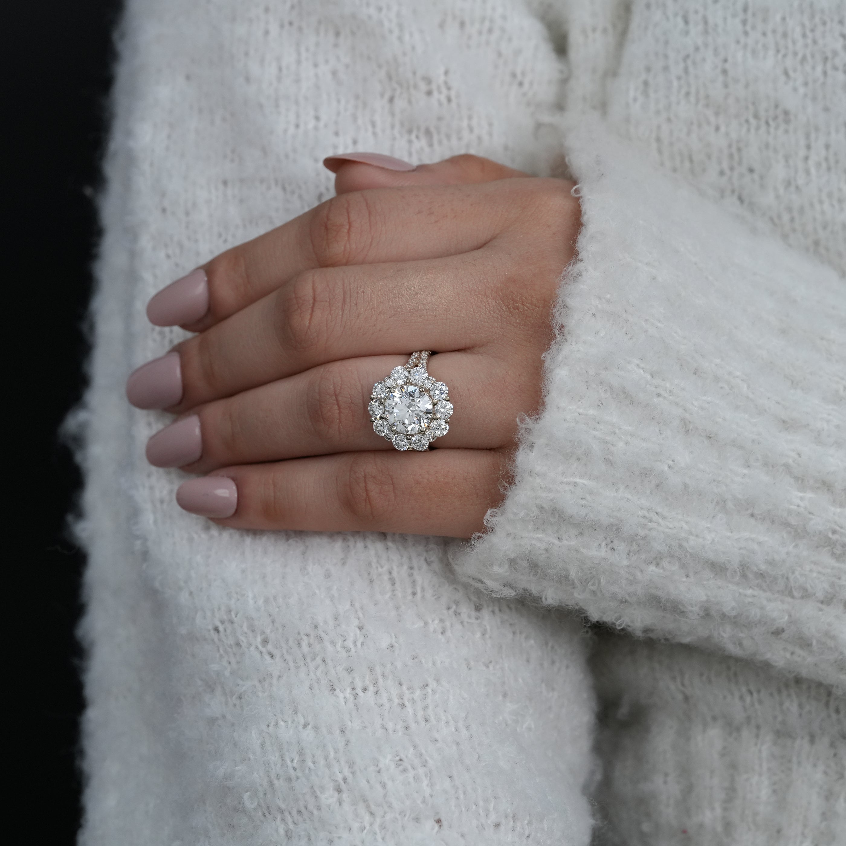Elegant round lab grown diamond ring with floral halo sparkle