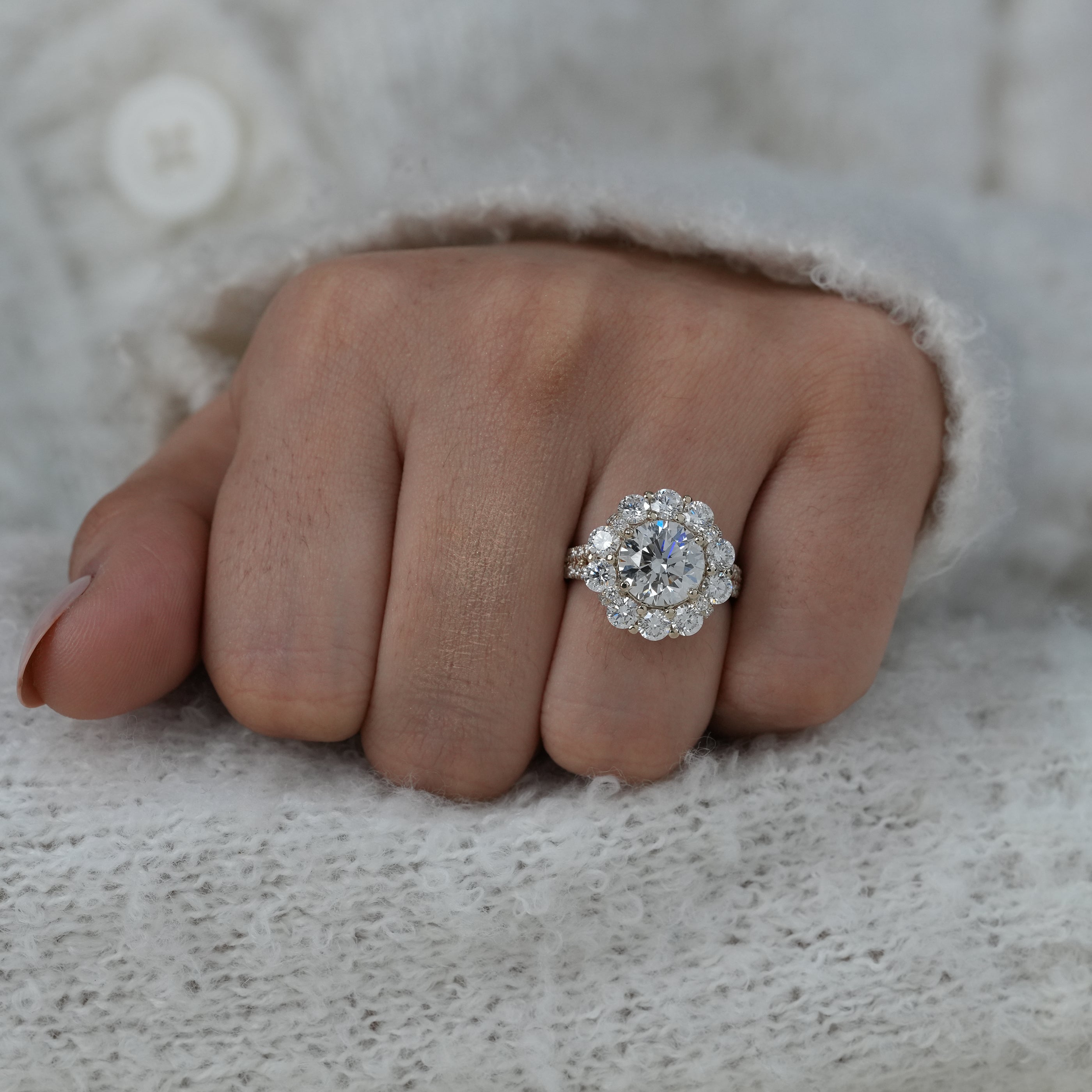 Round lab grown diamond halo ring with multi stone surround