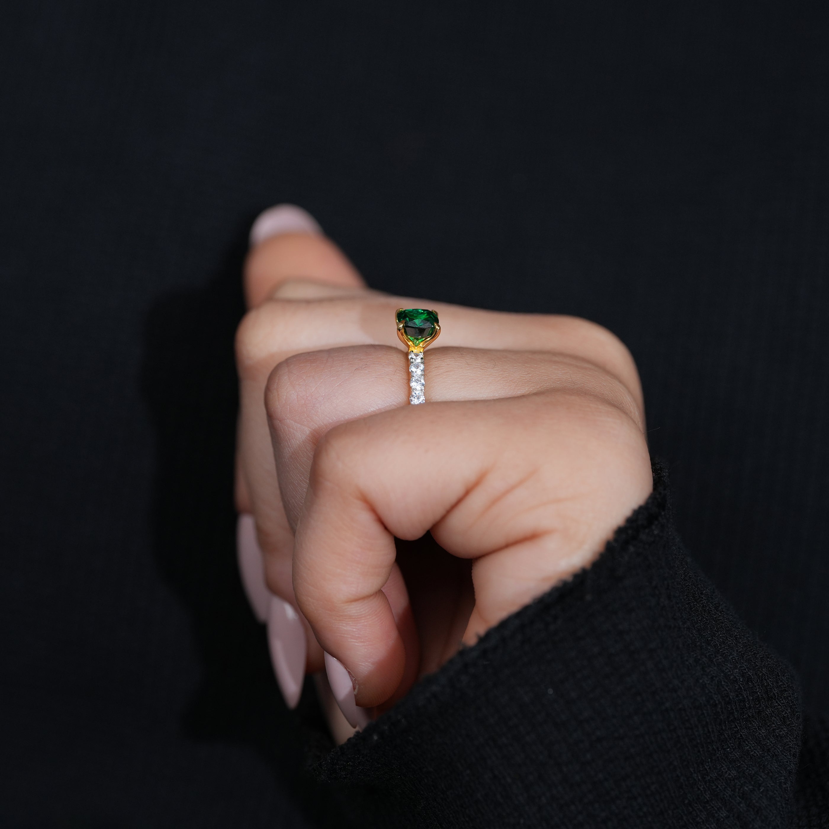 Minimal yellow gold engagement ring with green lab grown diamond