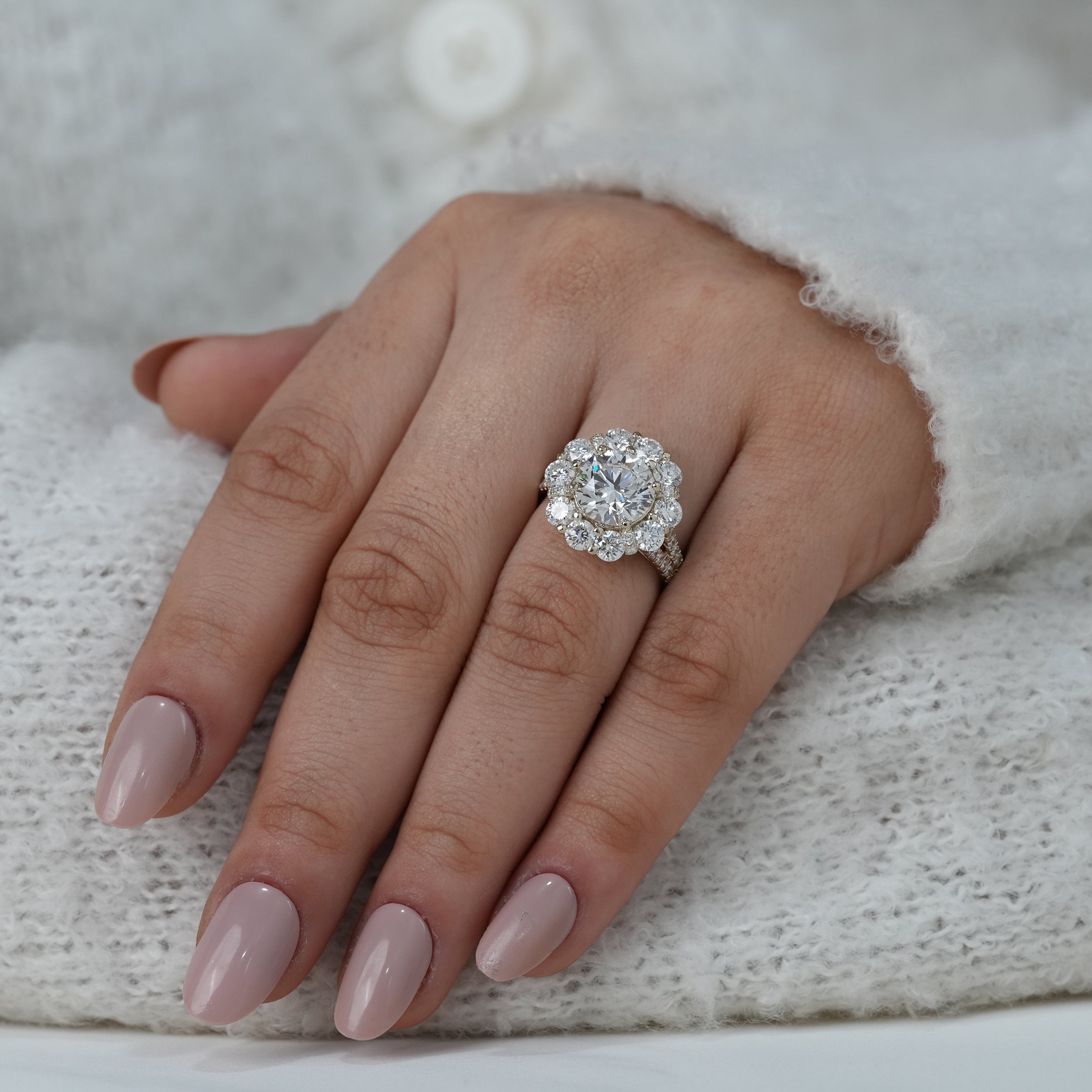 Statement round lab grown diamond engagement ring with halo
