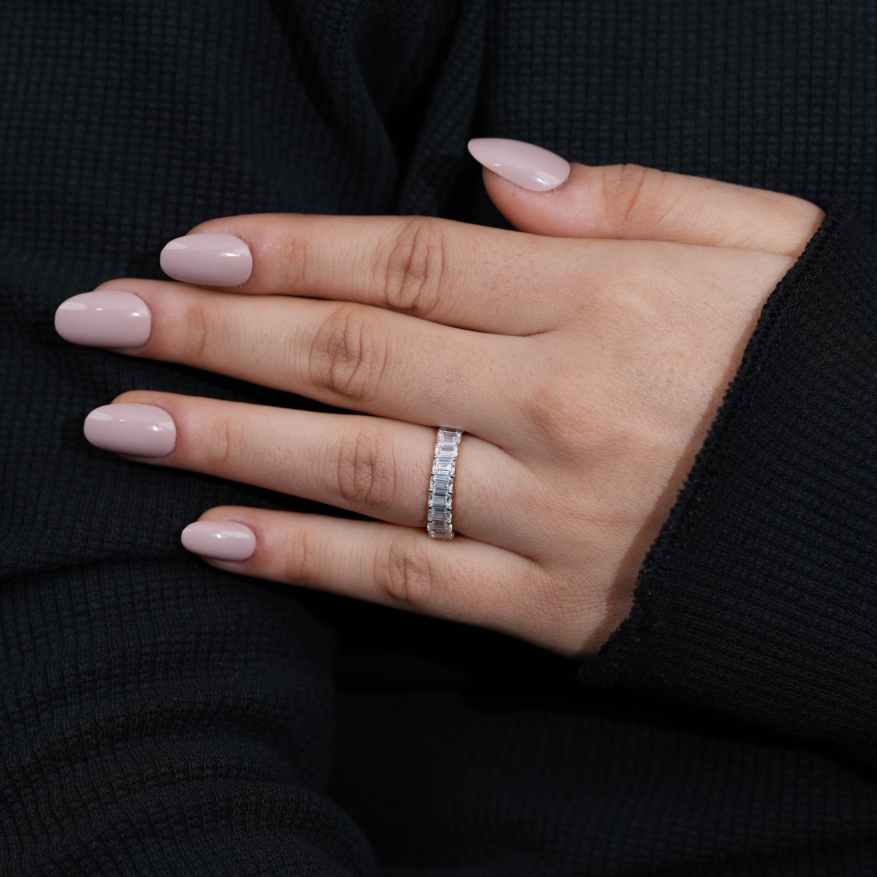 Full eternity band featuring emerald cut lab grown diamonds