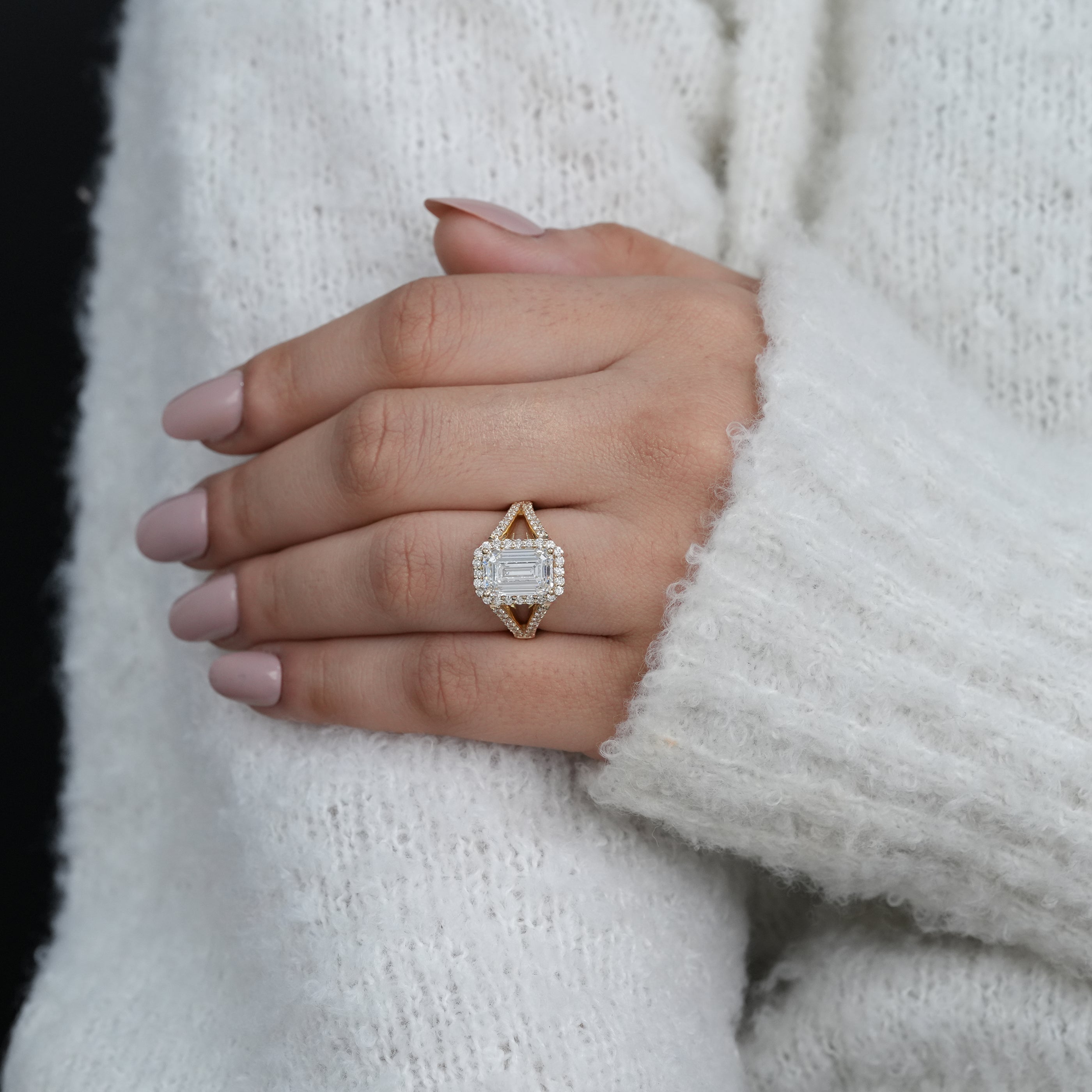 Emerald cut lab grown diamond ring with split shank design