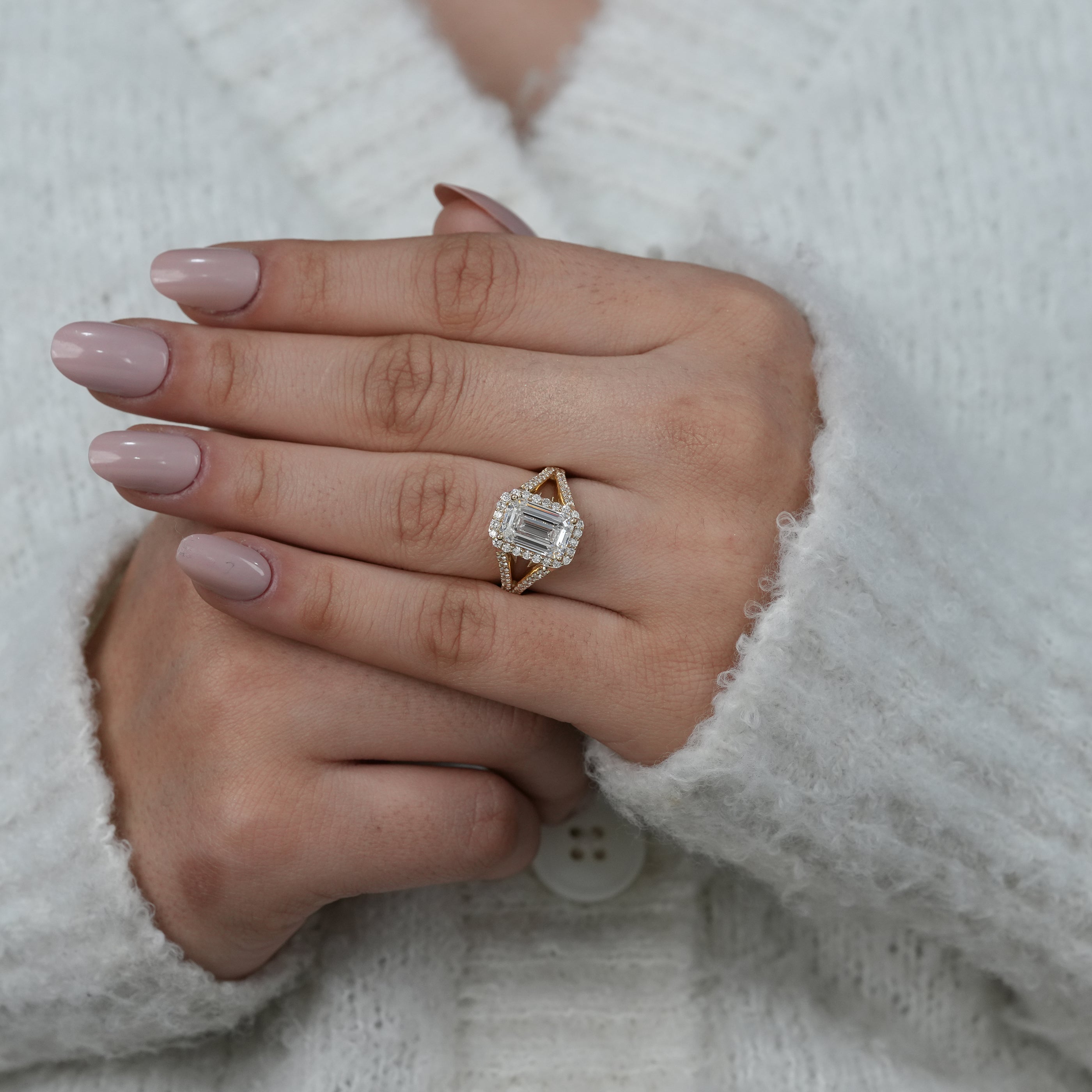 Emerald lab grown diamond engagement ring with sparkling halo