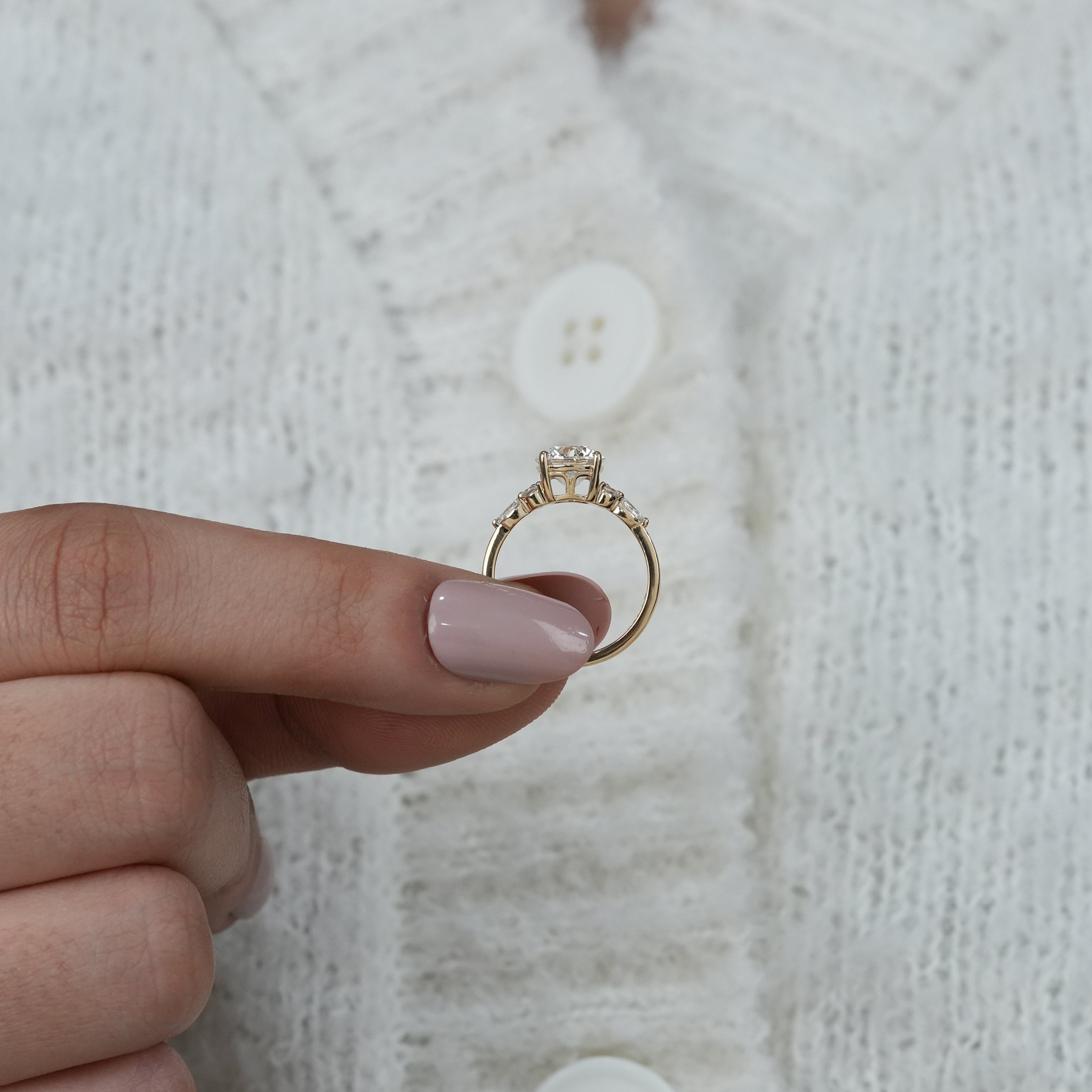 Yellow gold ring with round lab grown diamond center