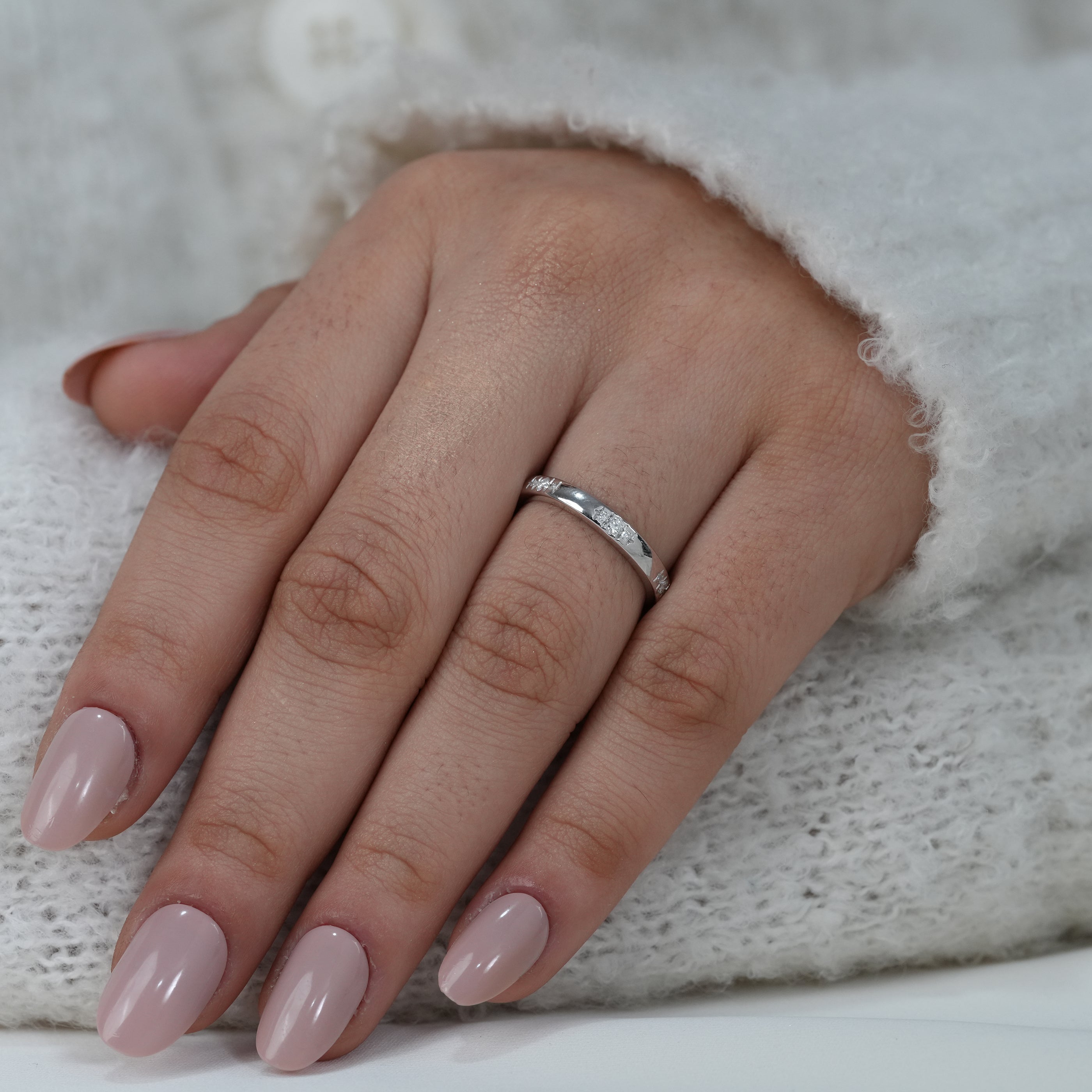 Refined white gold ring with delicate flush diamonds