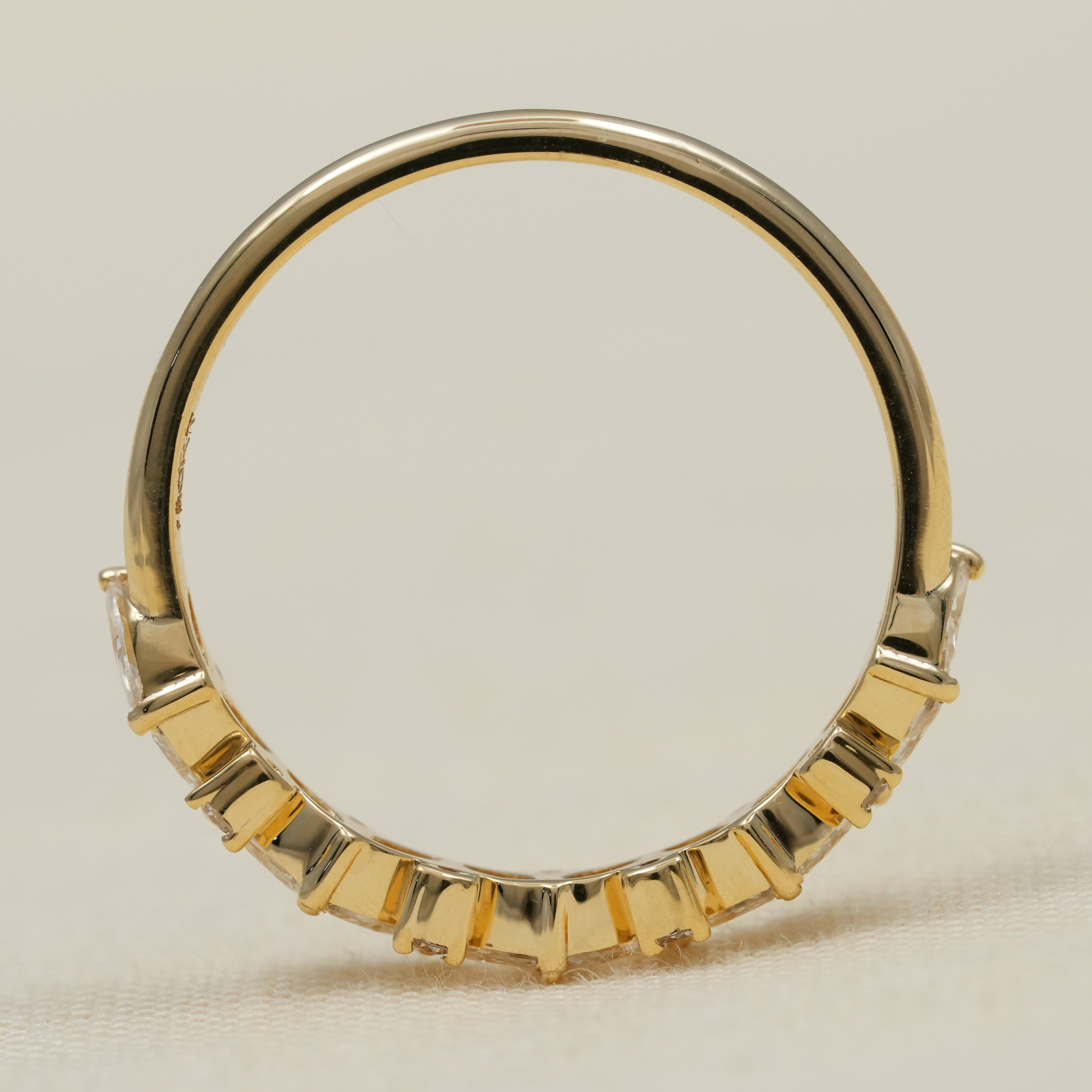 Marquise lab grown diamond band with delicate clustered design