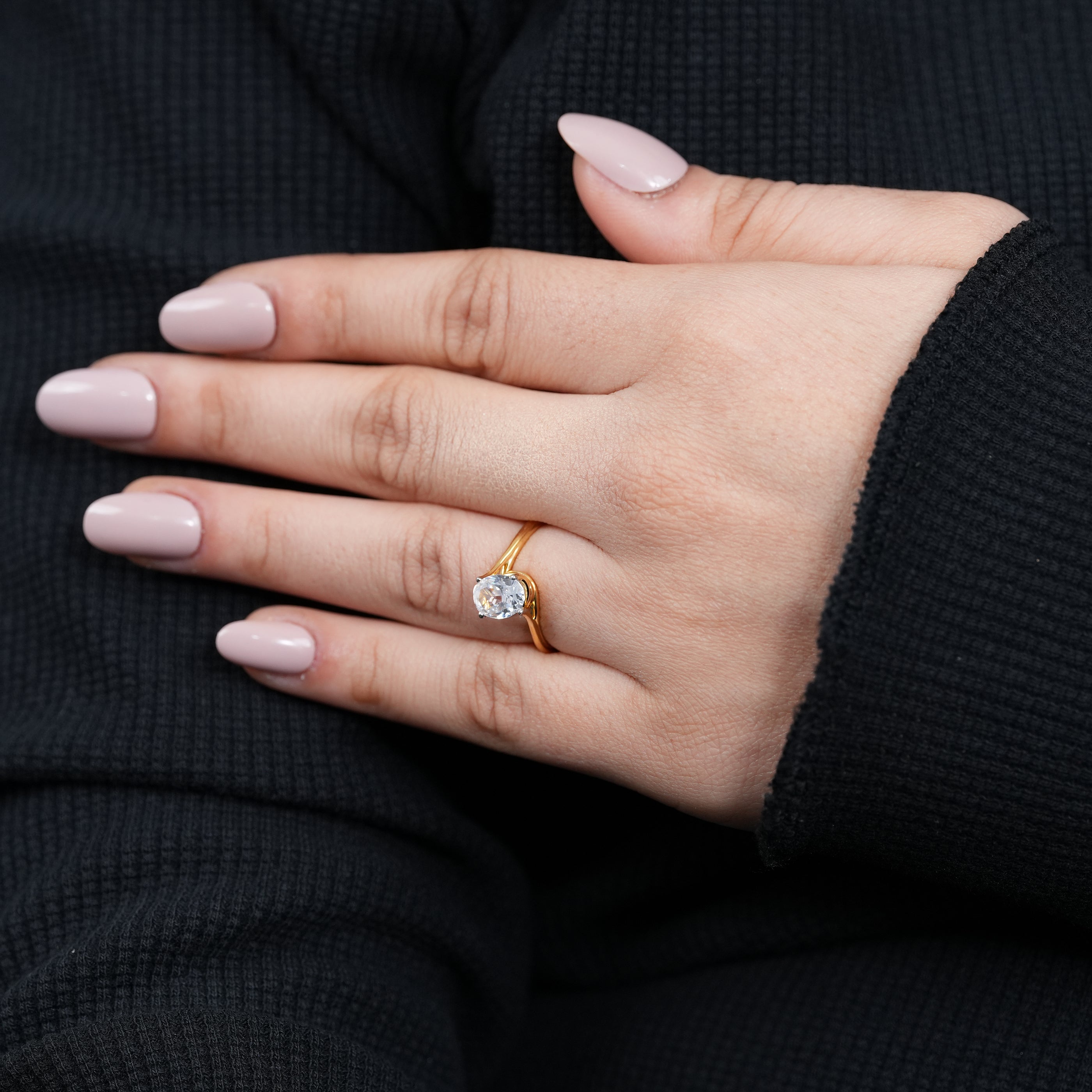 Contemporary oval lab grown diamond solitaire ring flowing yellow gold band